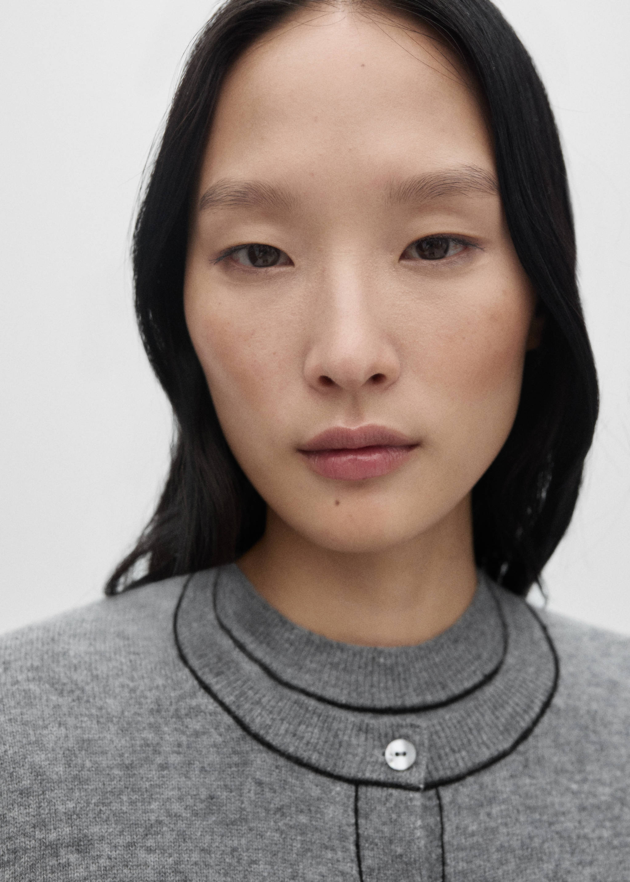 Wool cardigan with decorative stitching - Details of the article 1