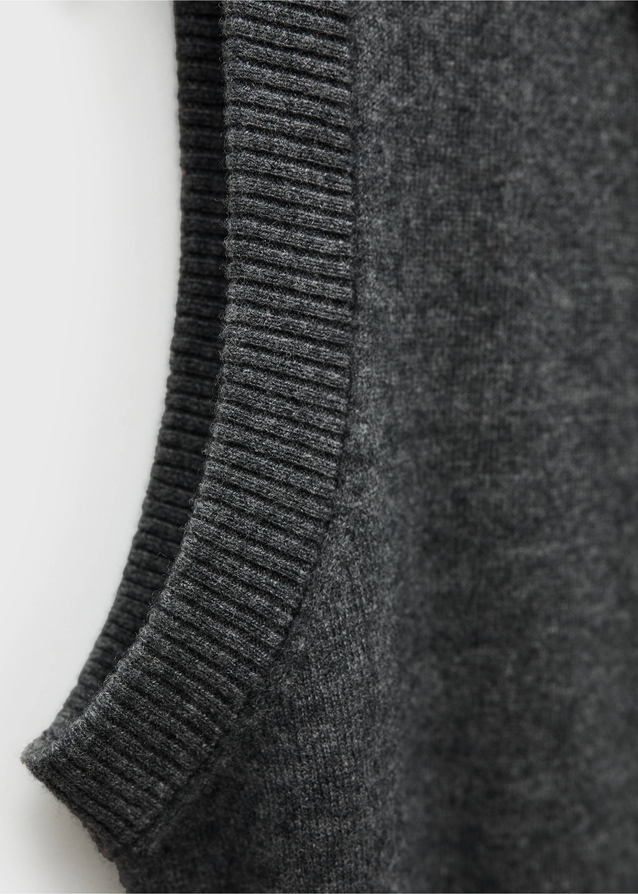 Wool-blend gilet with buttons - Details of the article 8, Dark Heather Grey. Ref: 77056747-00.
