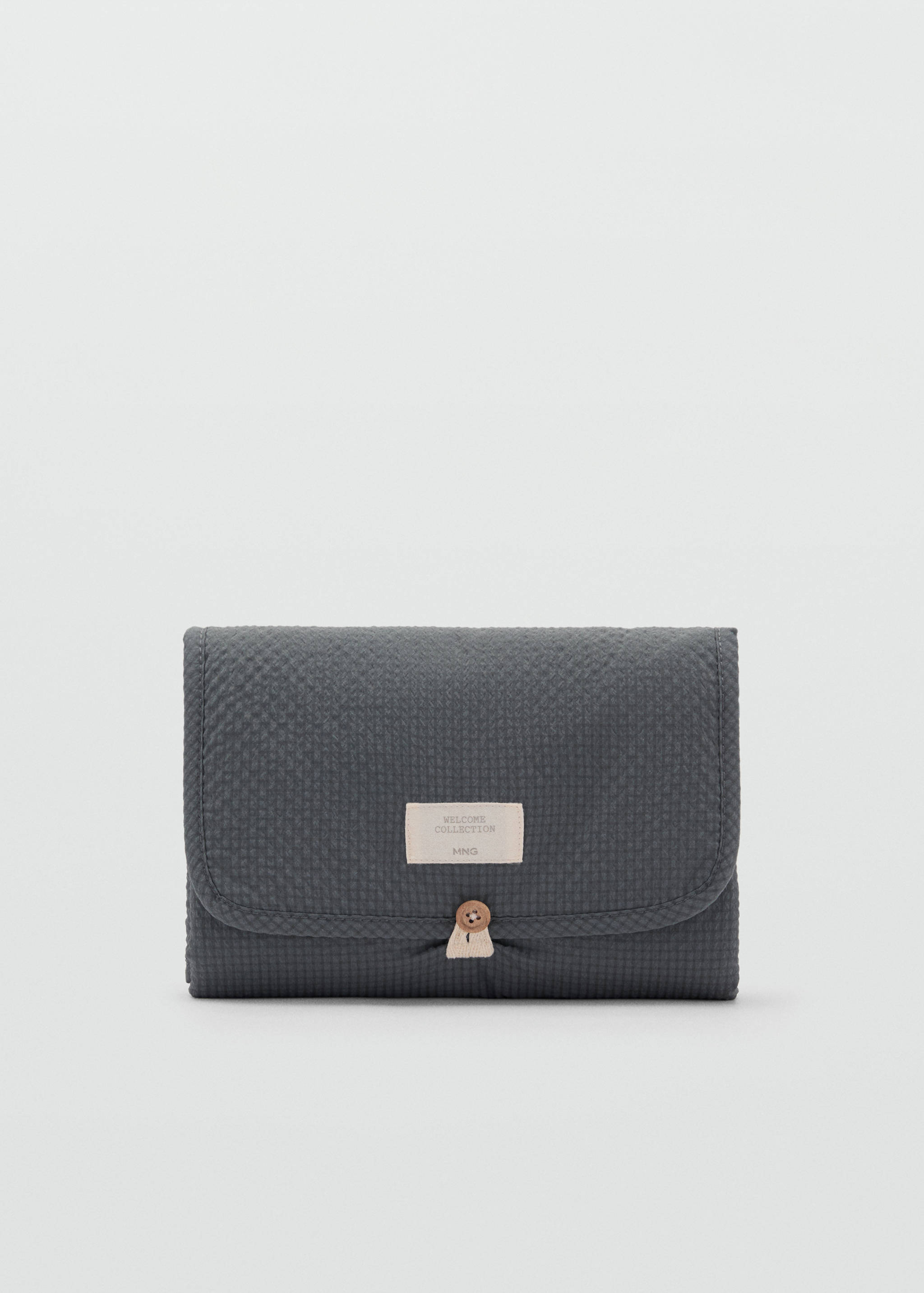 حصيرة لتغيير الحفاضات أثناء السفر بمربعات - منتج دون نموذج