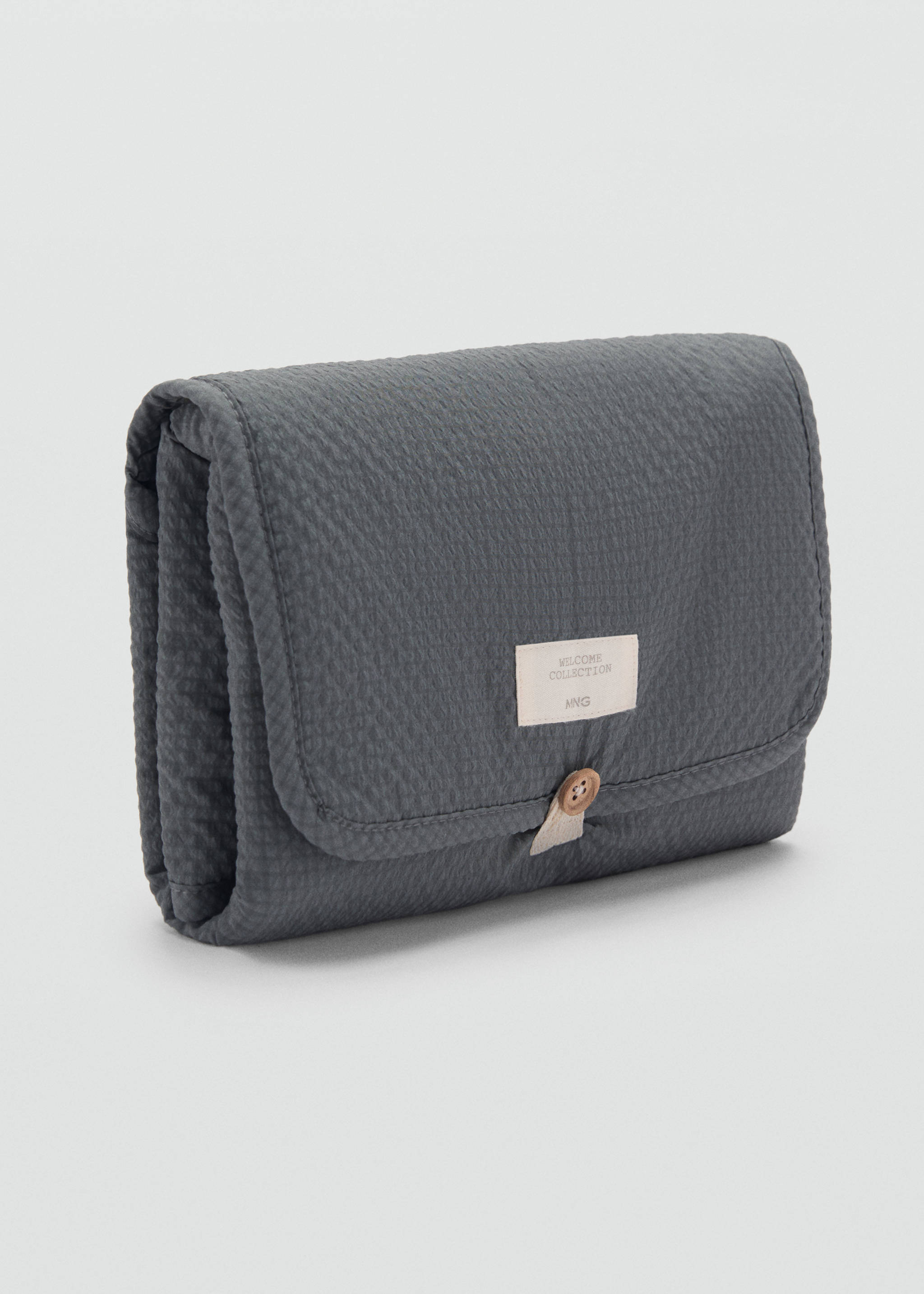 حصيرة لتغيير الحفاضات أثناء السفر بمربعات - رؤية وسط