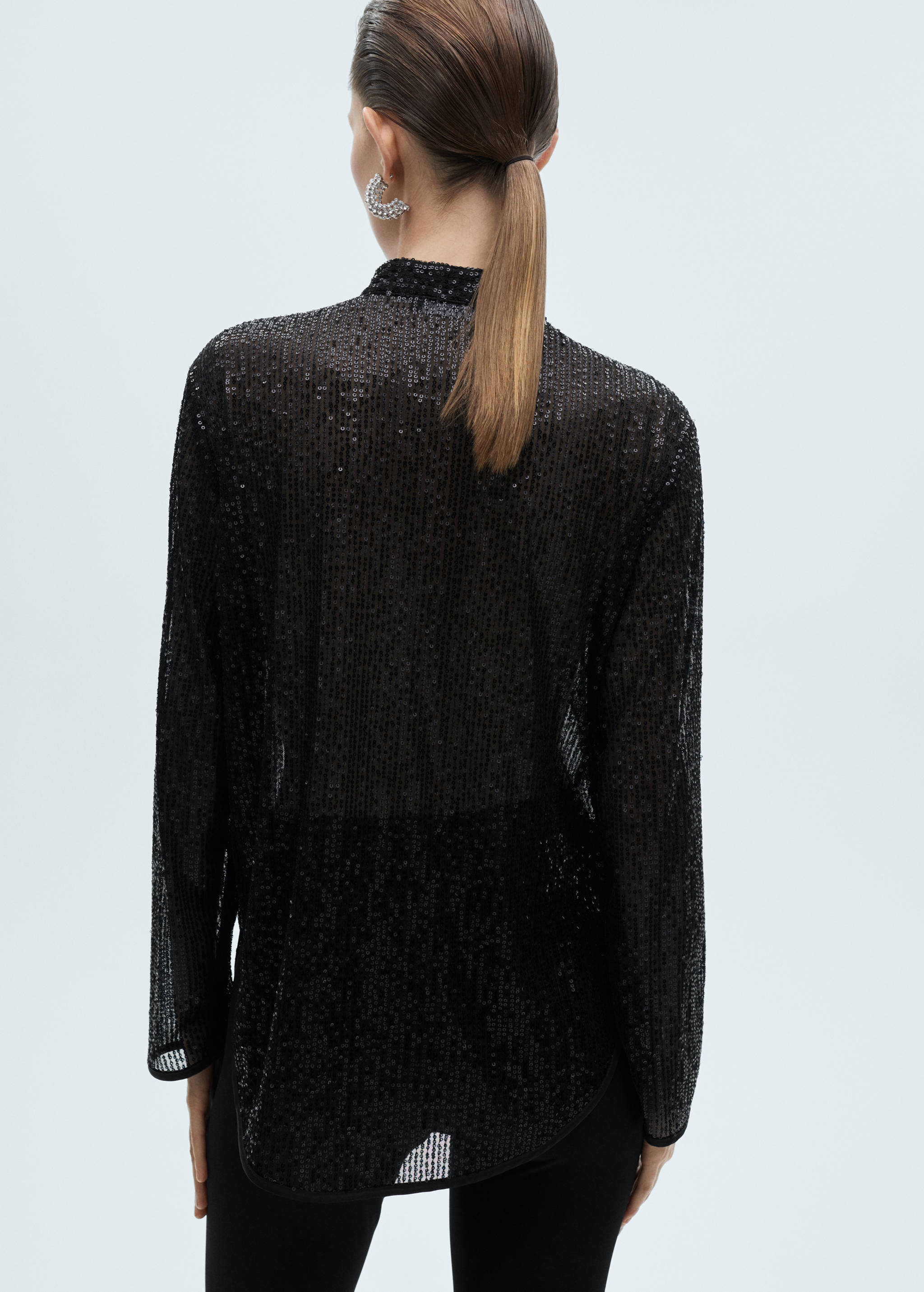 Semi-transparent sequined shirt - Reverse of the article