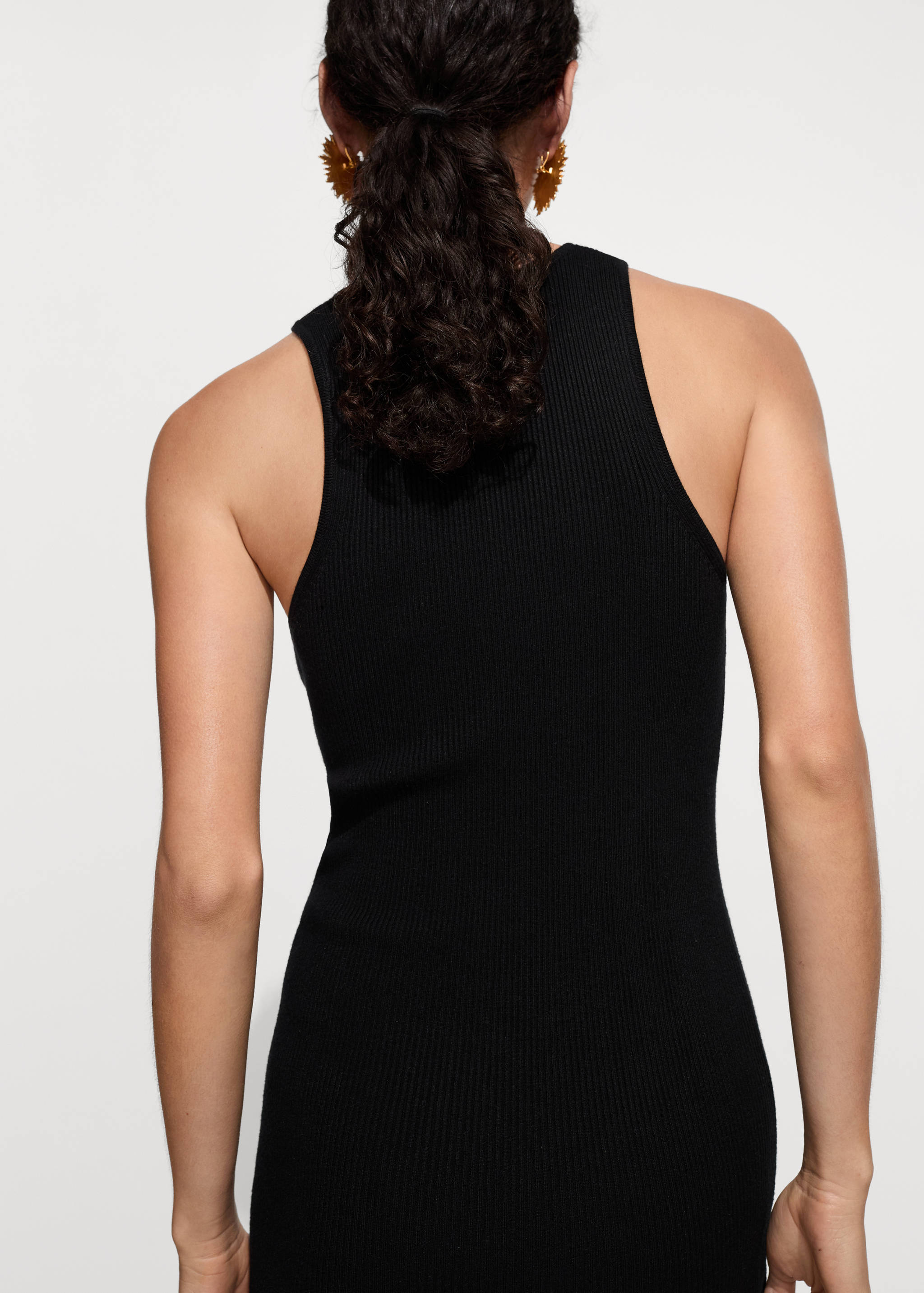 Short knitted dress - Reverse of the article