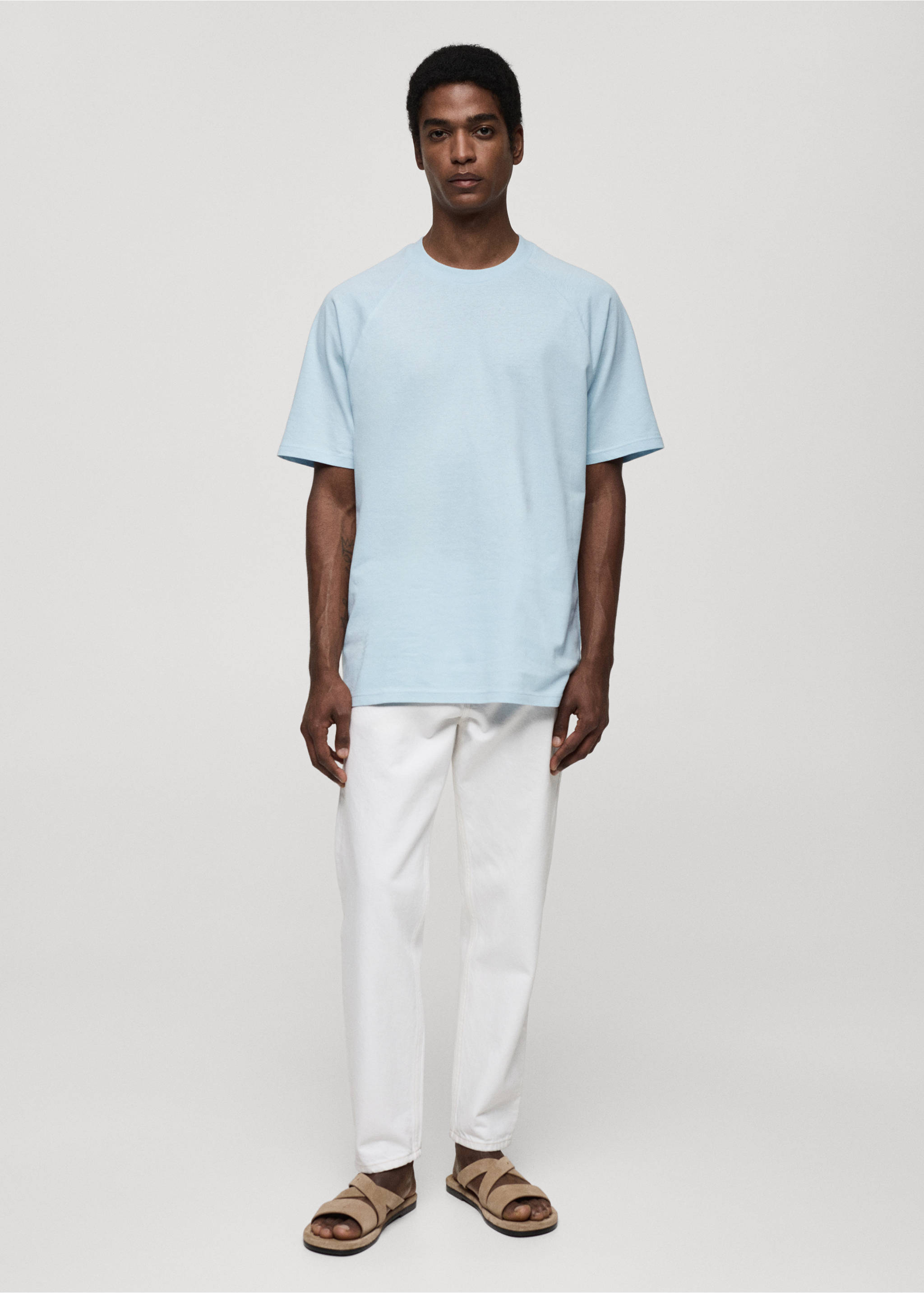 Light blue crew neck t-shirt worn with white trousers., Sky Blue. Ref: 77060356-00.
