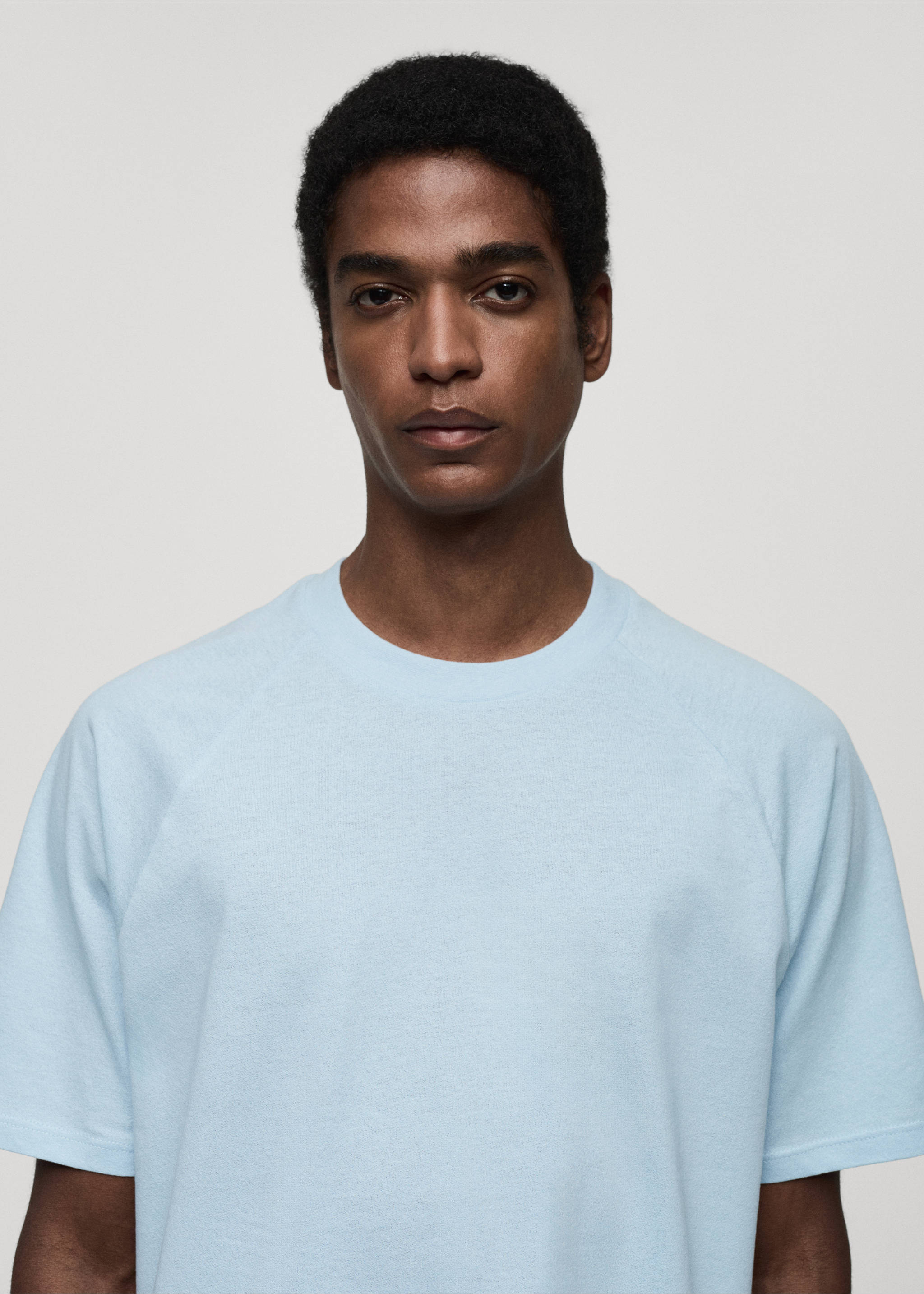 Light blue short-sleeved t-shirt with a round neckline on a model., Sky Blue. Ref: 77060356-00.