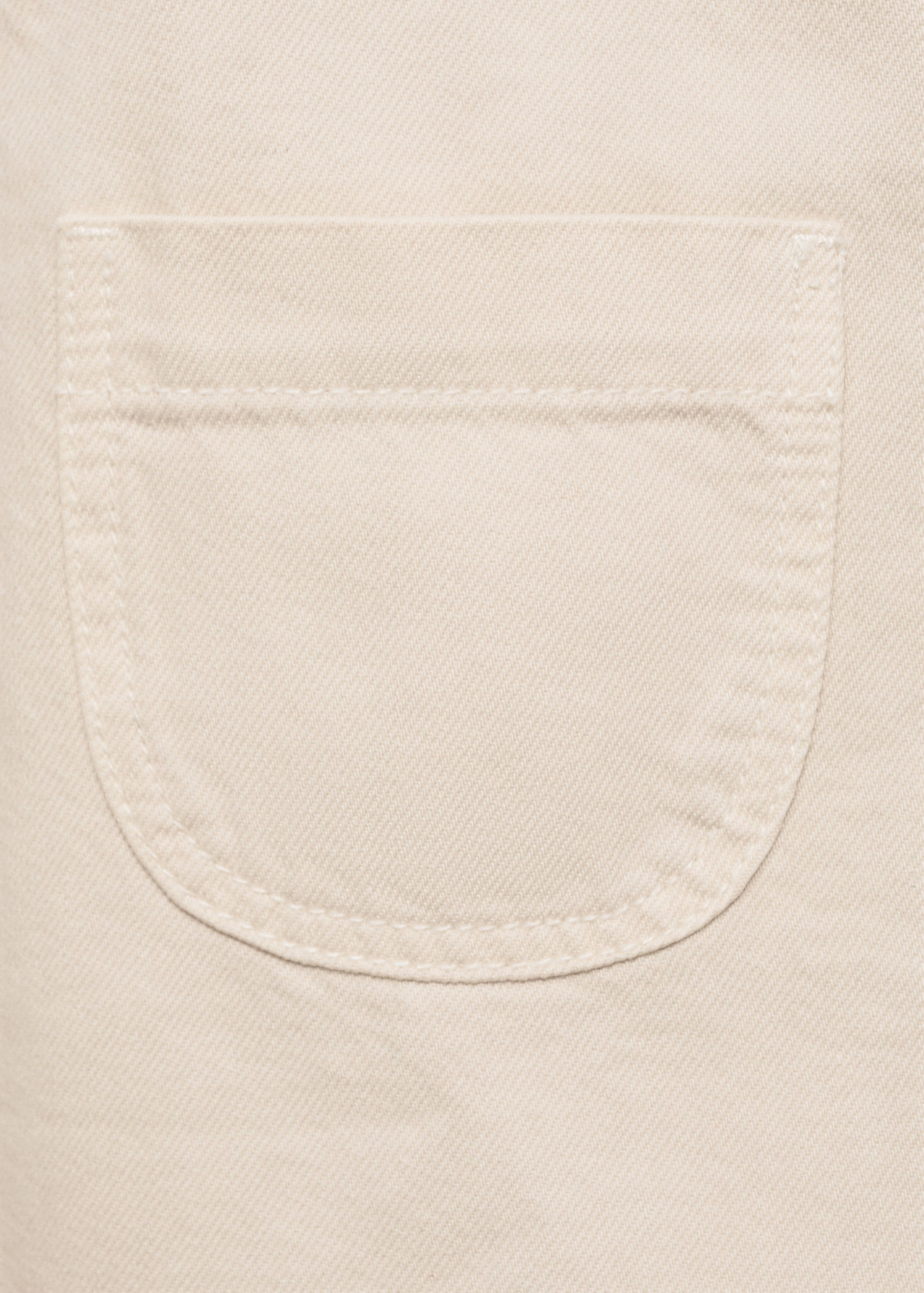 Short denim pinafore - Details of the article 0