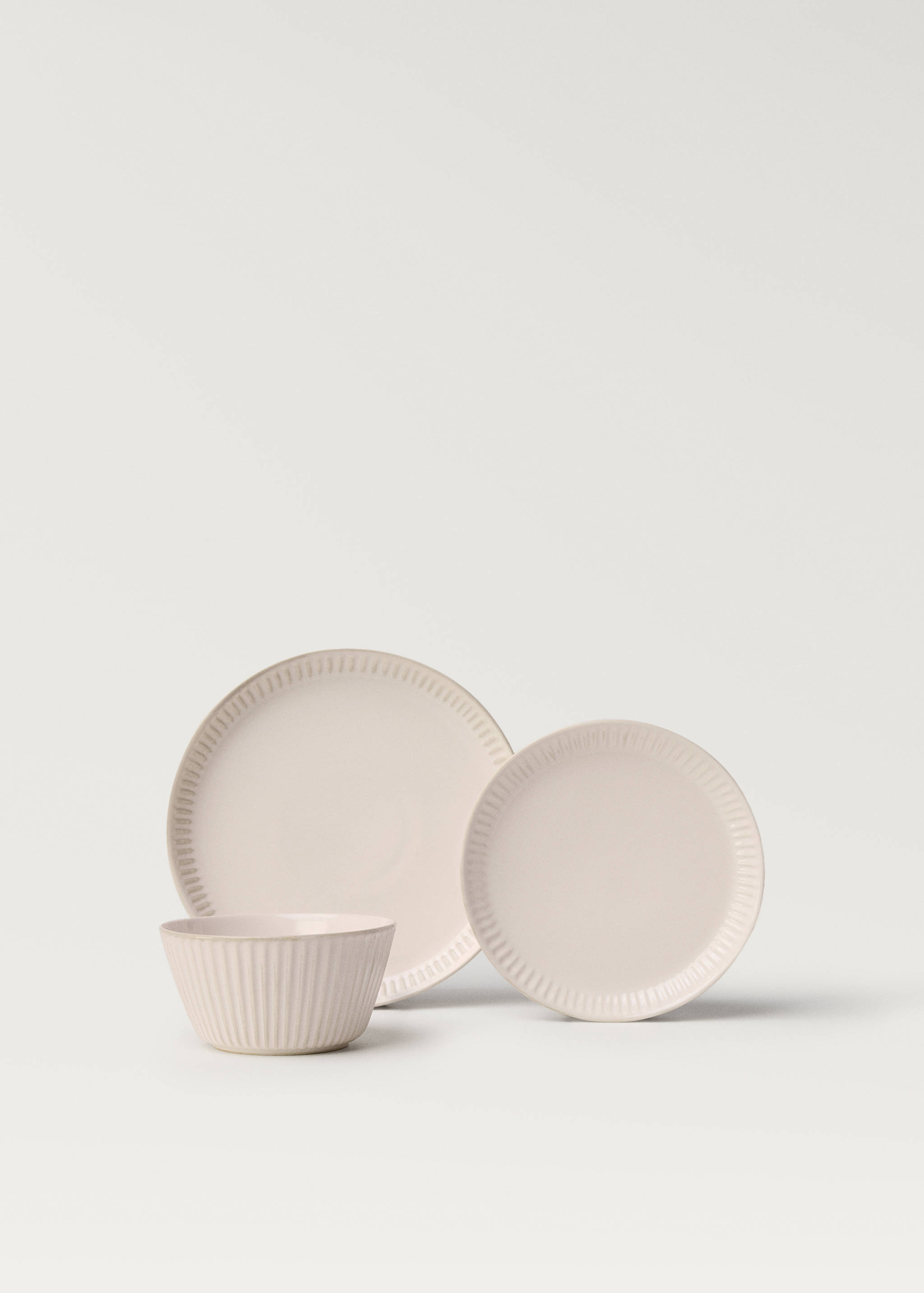 Dessertteller aus Steinzeug mit wellenförmigem Relief - Detail des Artikels 3