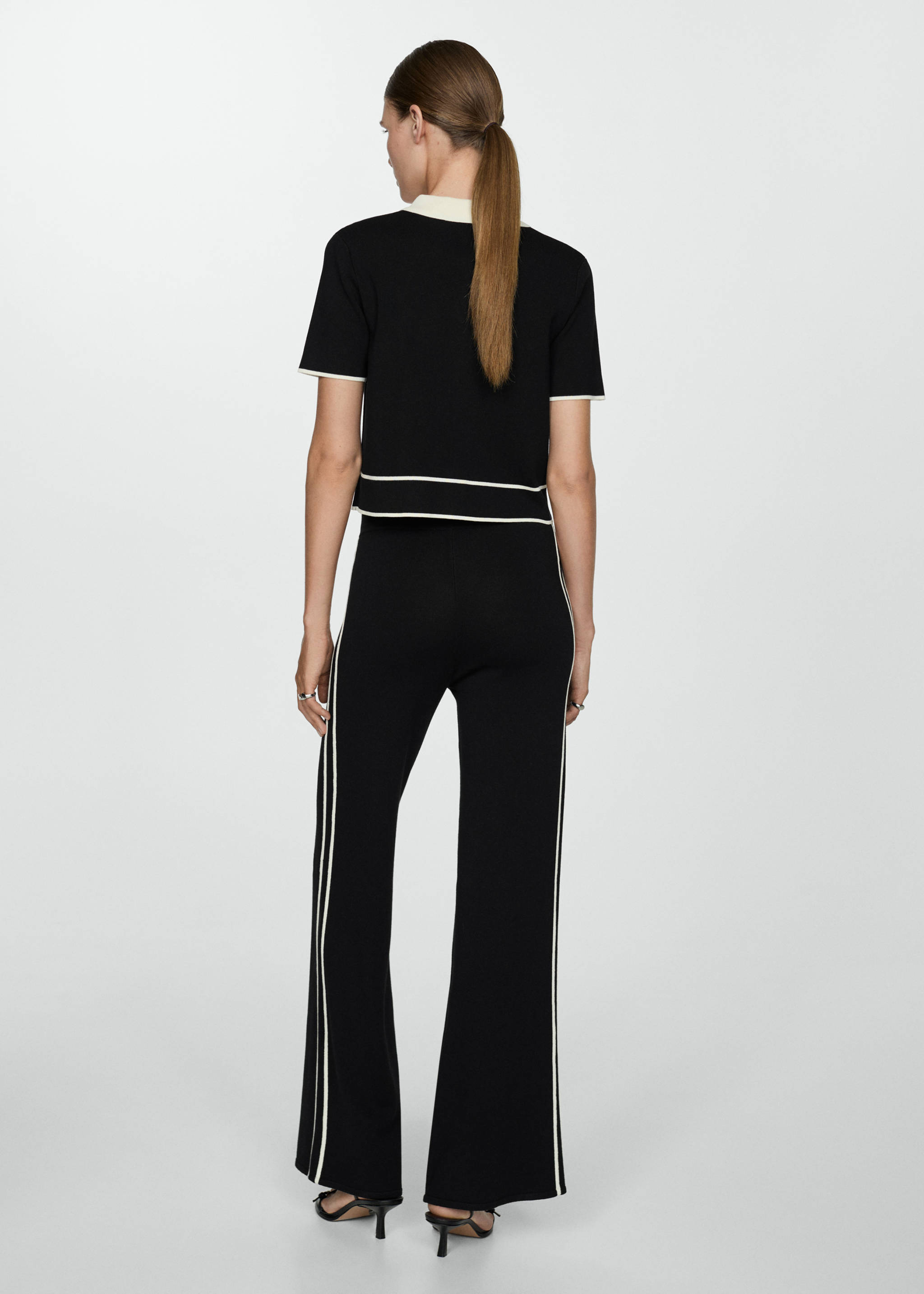 Knitted trousers with contrasting stripes - Reverse of the article