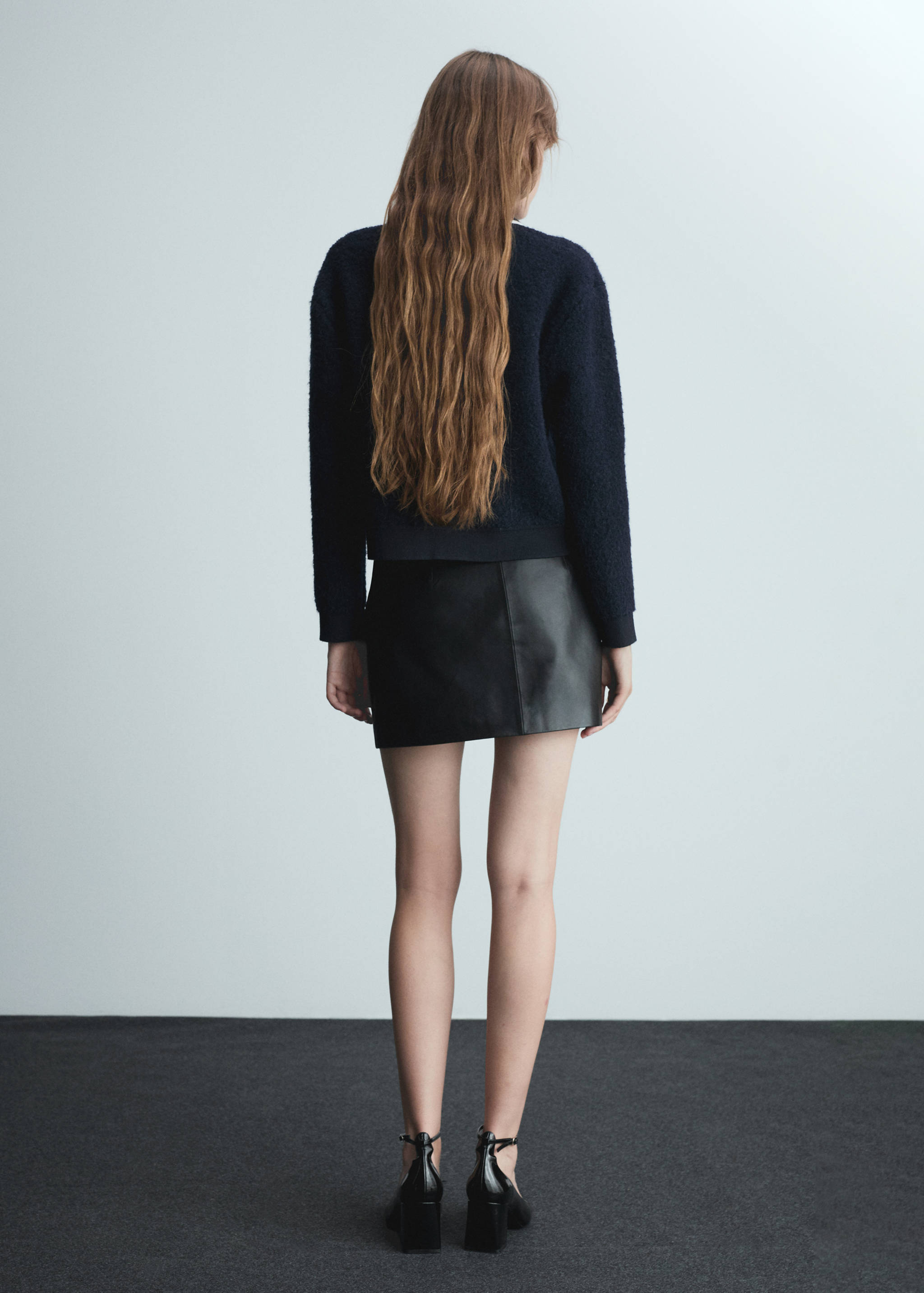 Knitted buttoned jacket - Reverse of the article