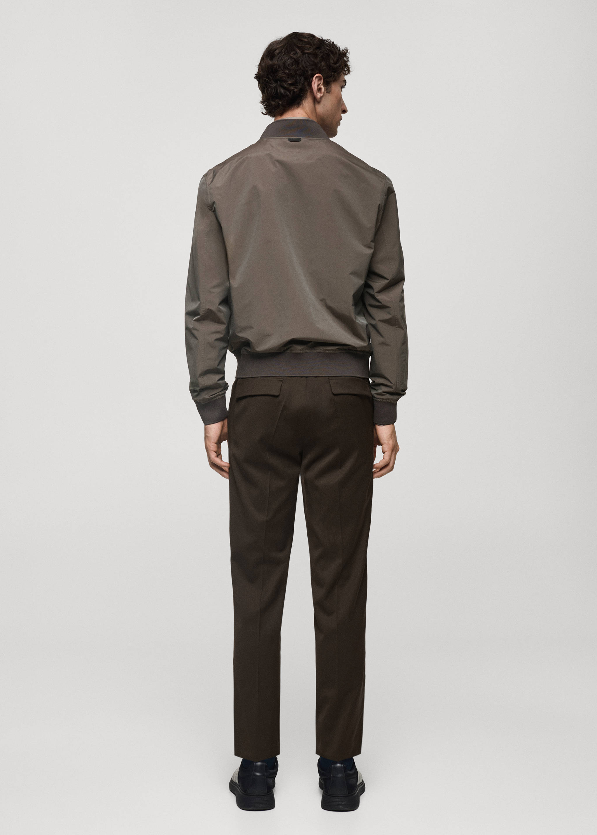 Bomber jacket in waterproof technical fabric - Reverse of the article