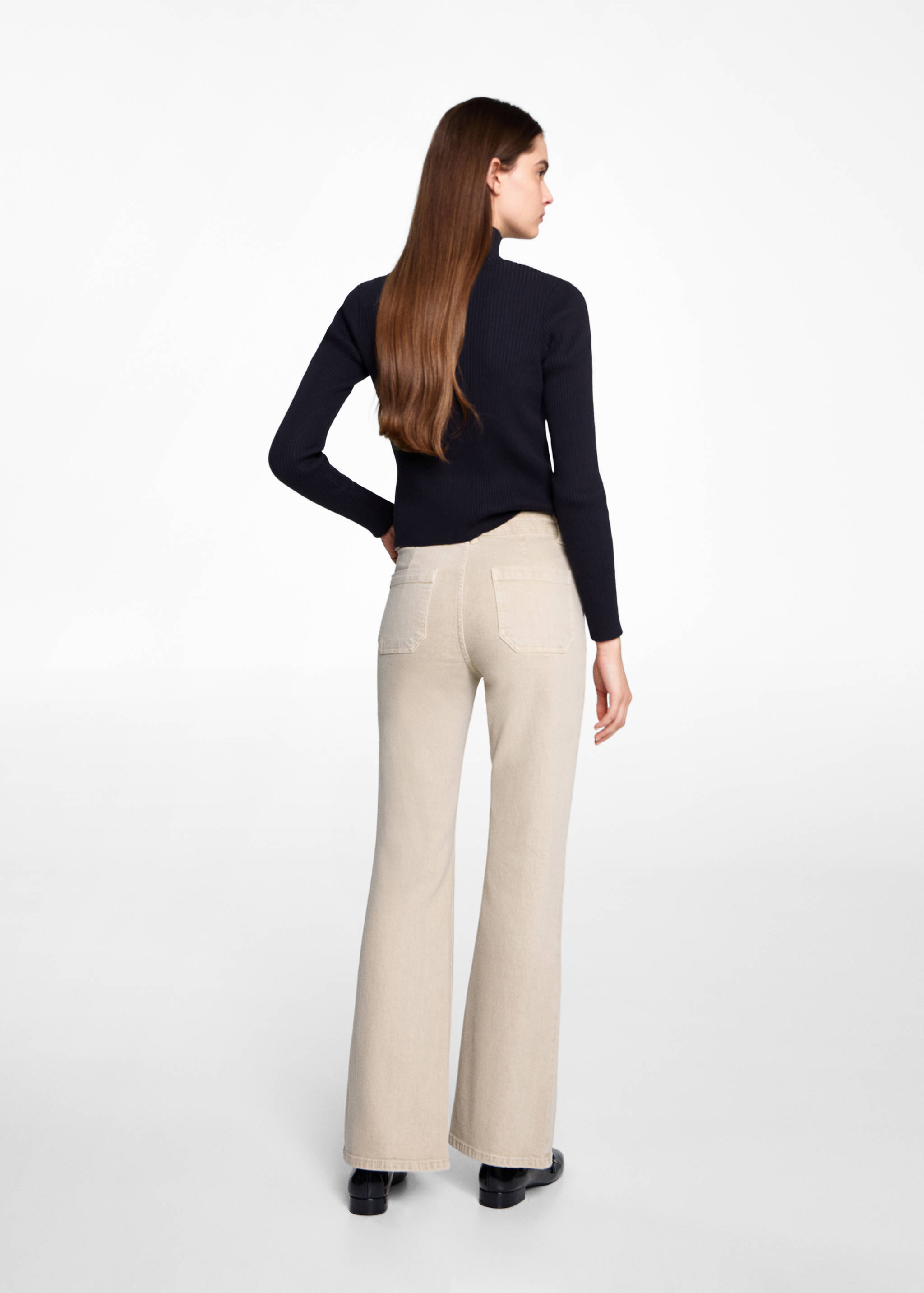 Flared jeans with pocket - Reverse of the article