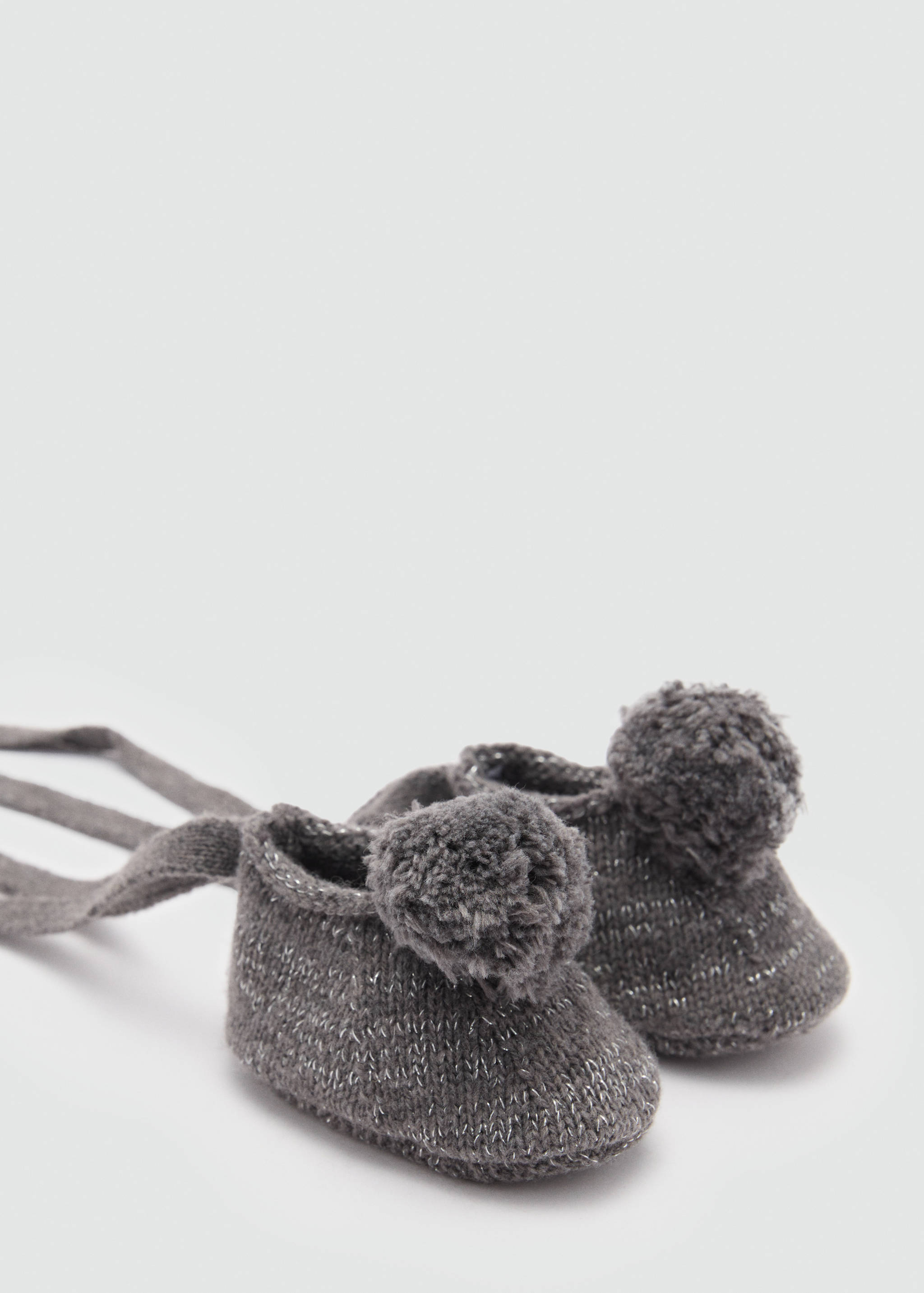 Patucos punto pompón - Reverso del artículo