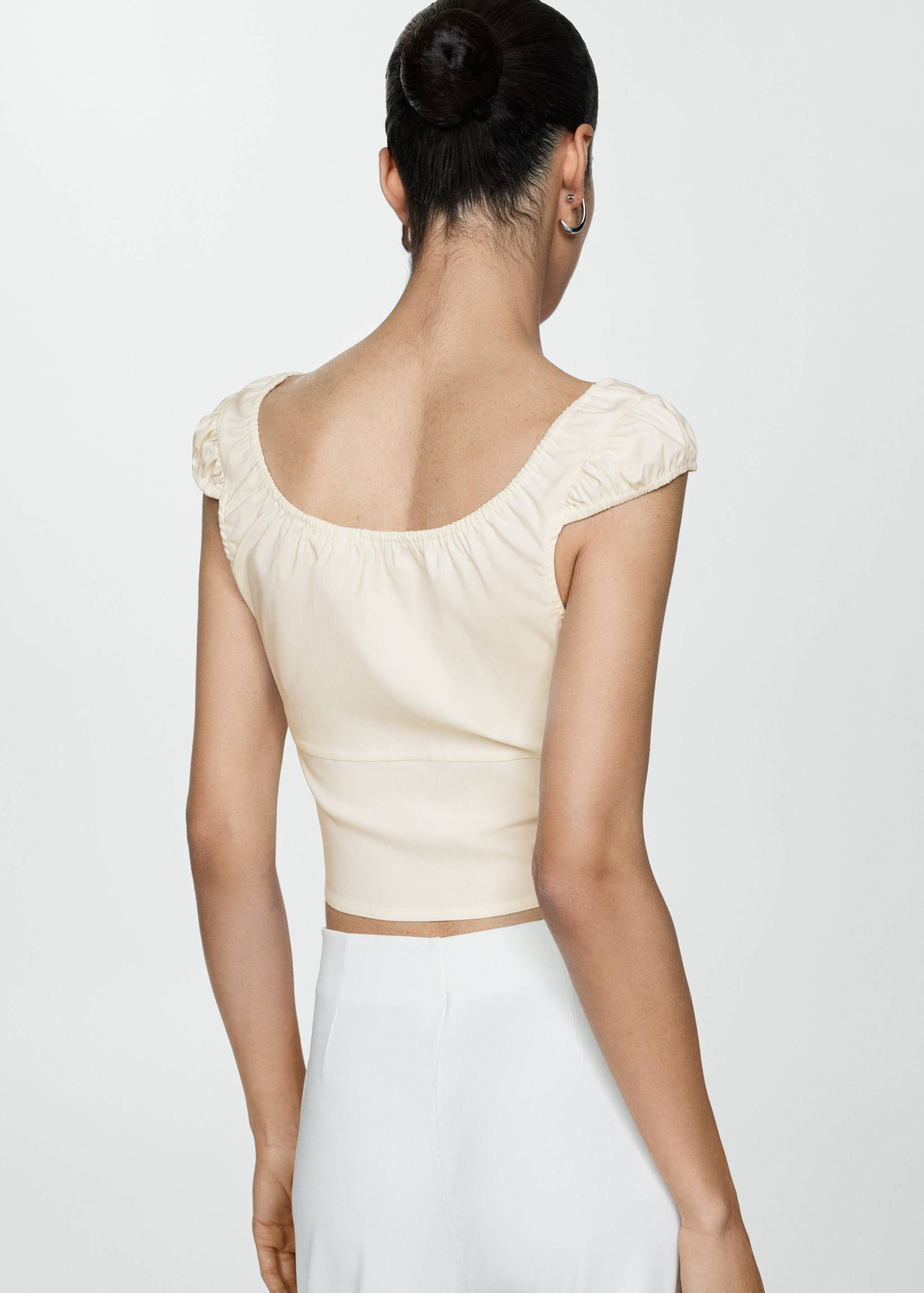 Buttoned crop top - Reverse of the article