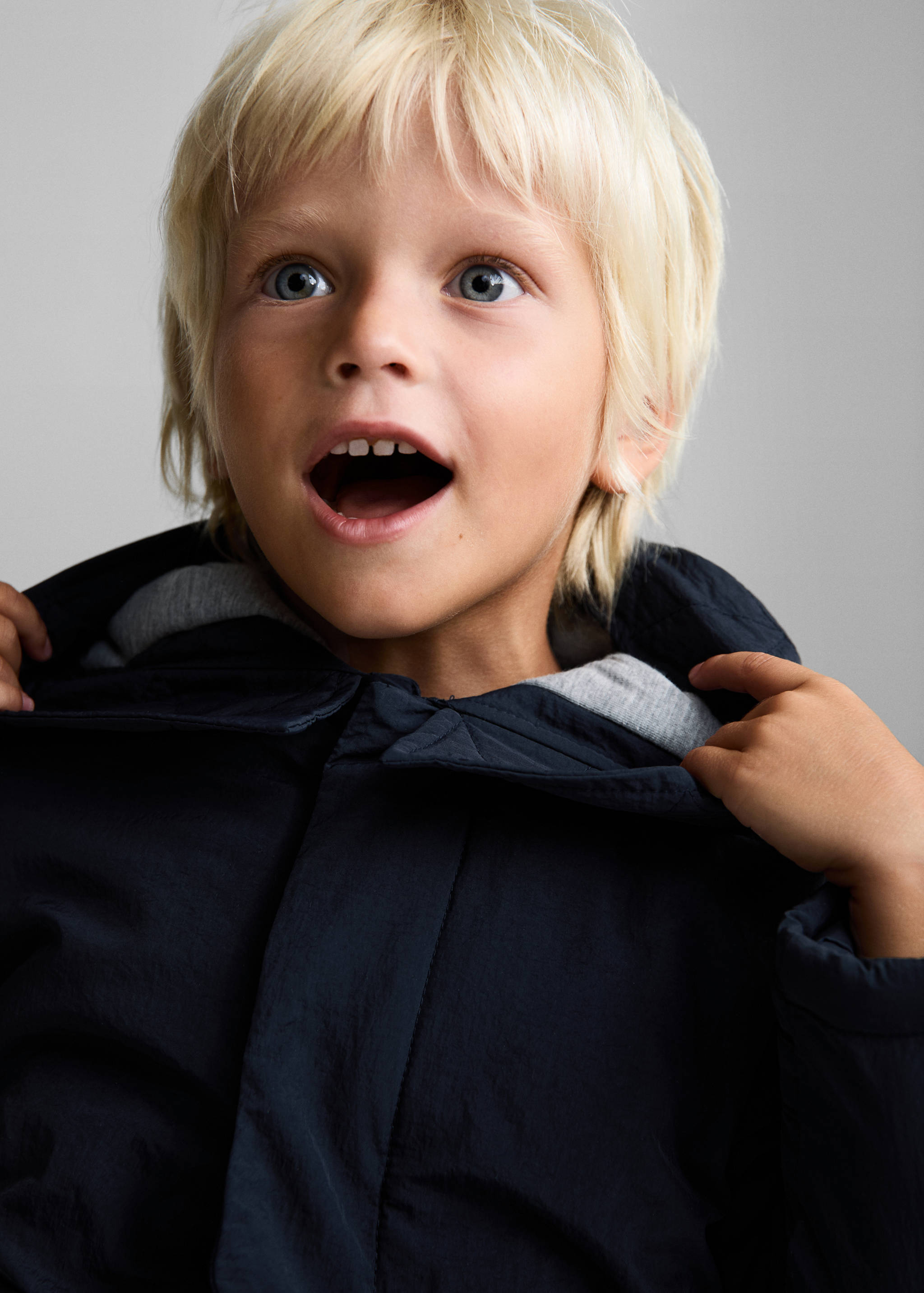 Pockets hooded coat - Details of the article 1