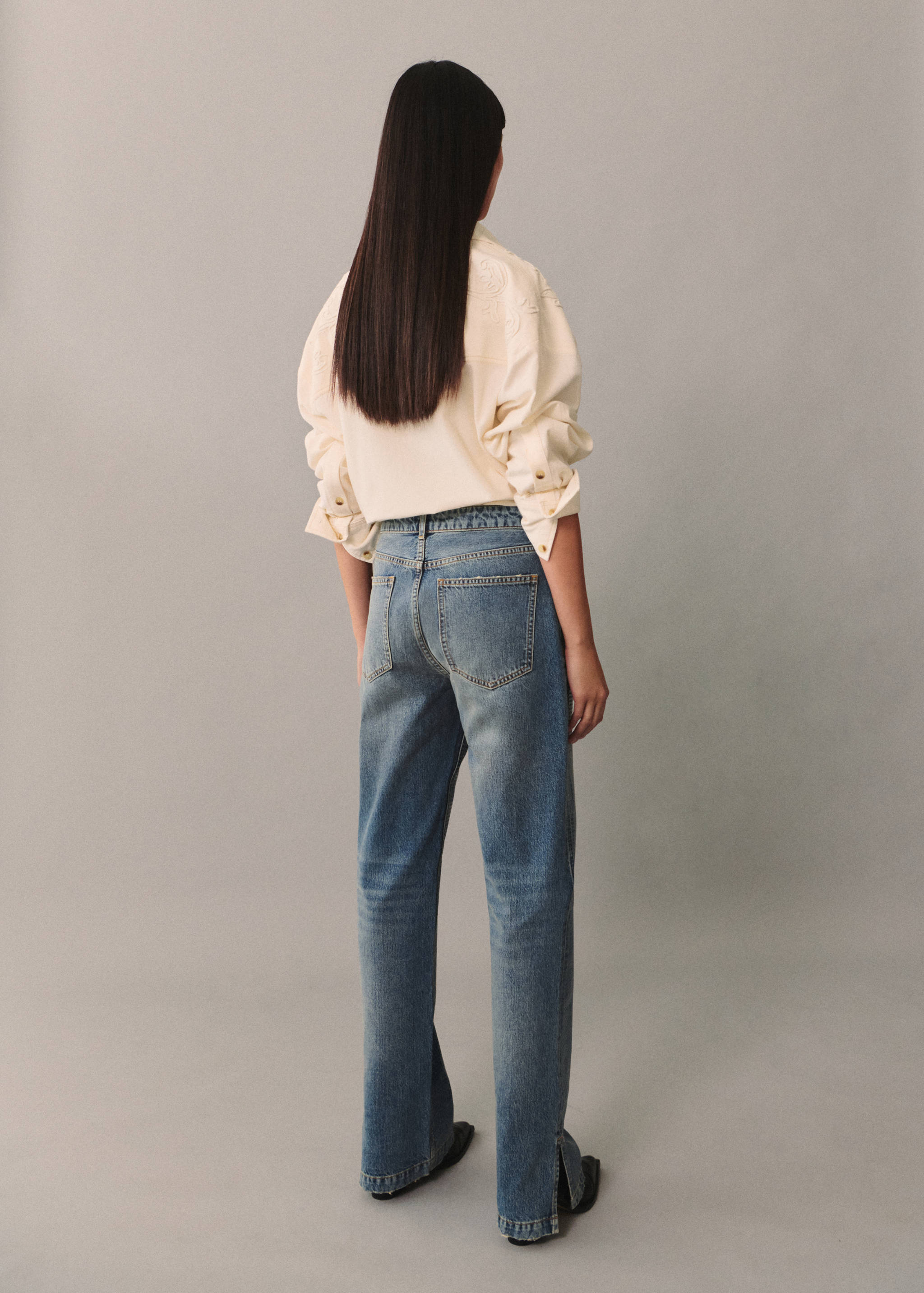 Jeans lentejuelas bajo aberturas - Reverso del artículo