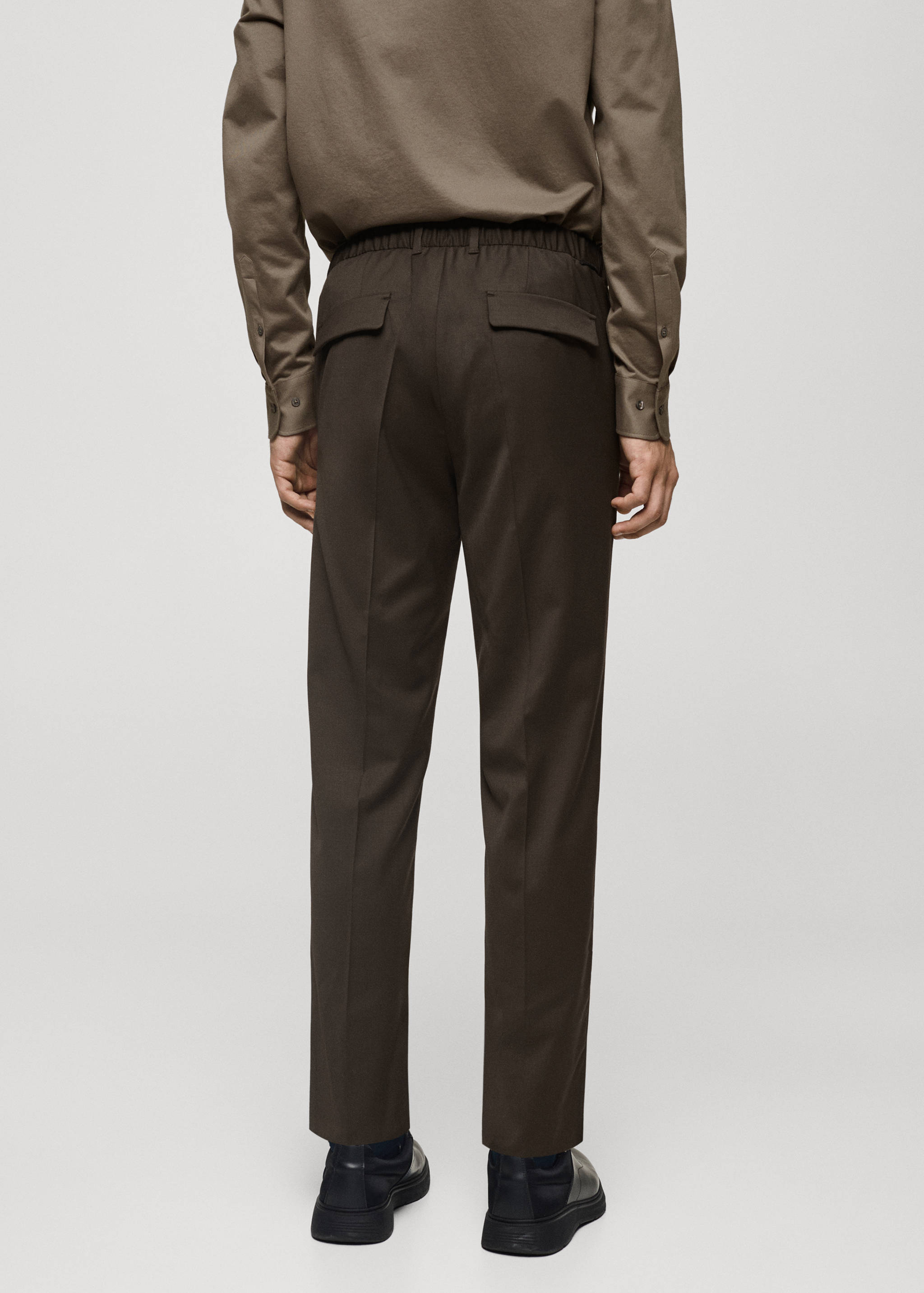 Coolmax® stretch-fabric slim-fit trousers - Reverse of the article