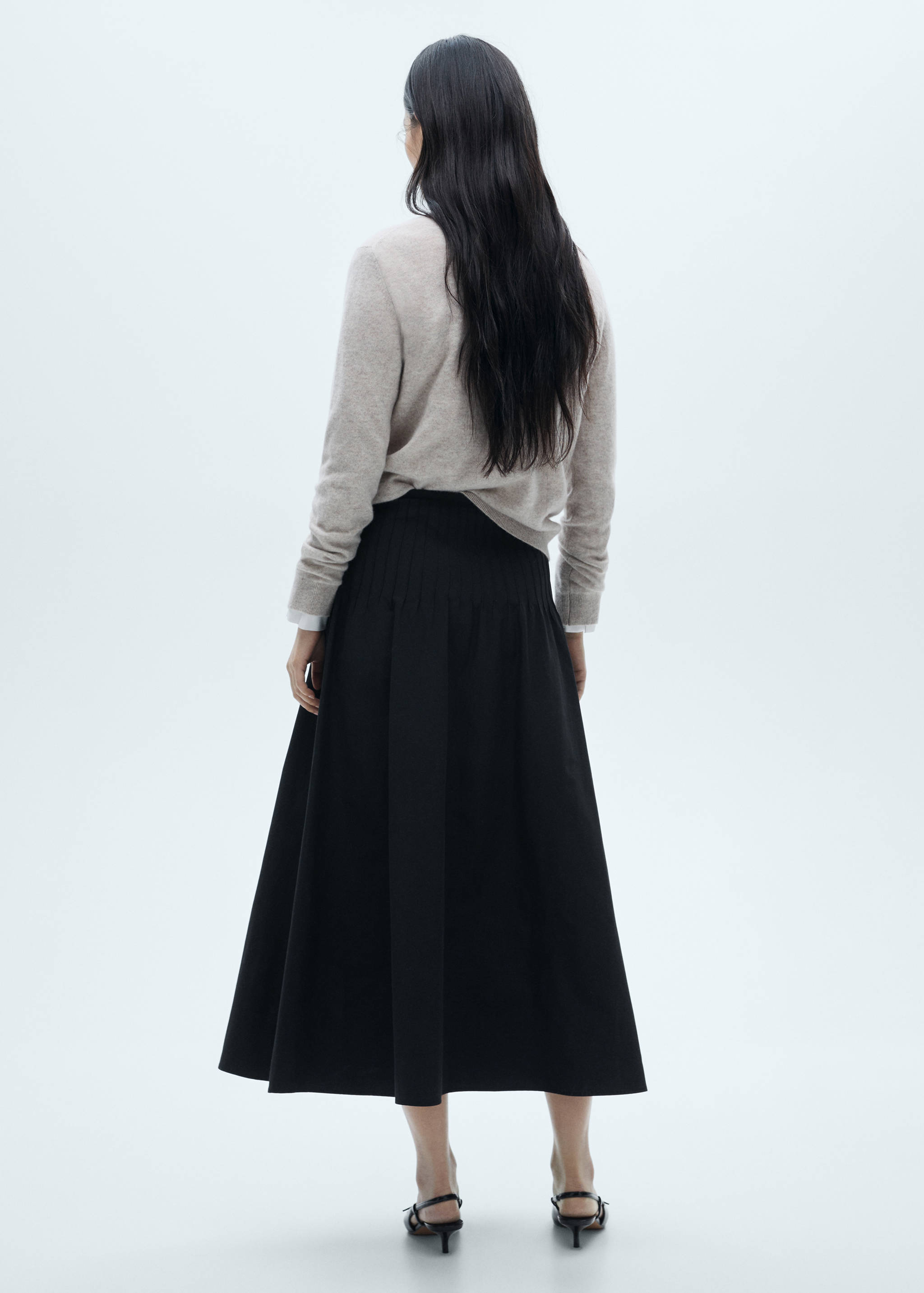 Flared skirt with pleated detail - Reverse of the article