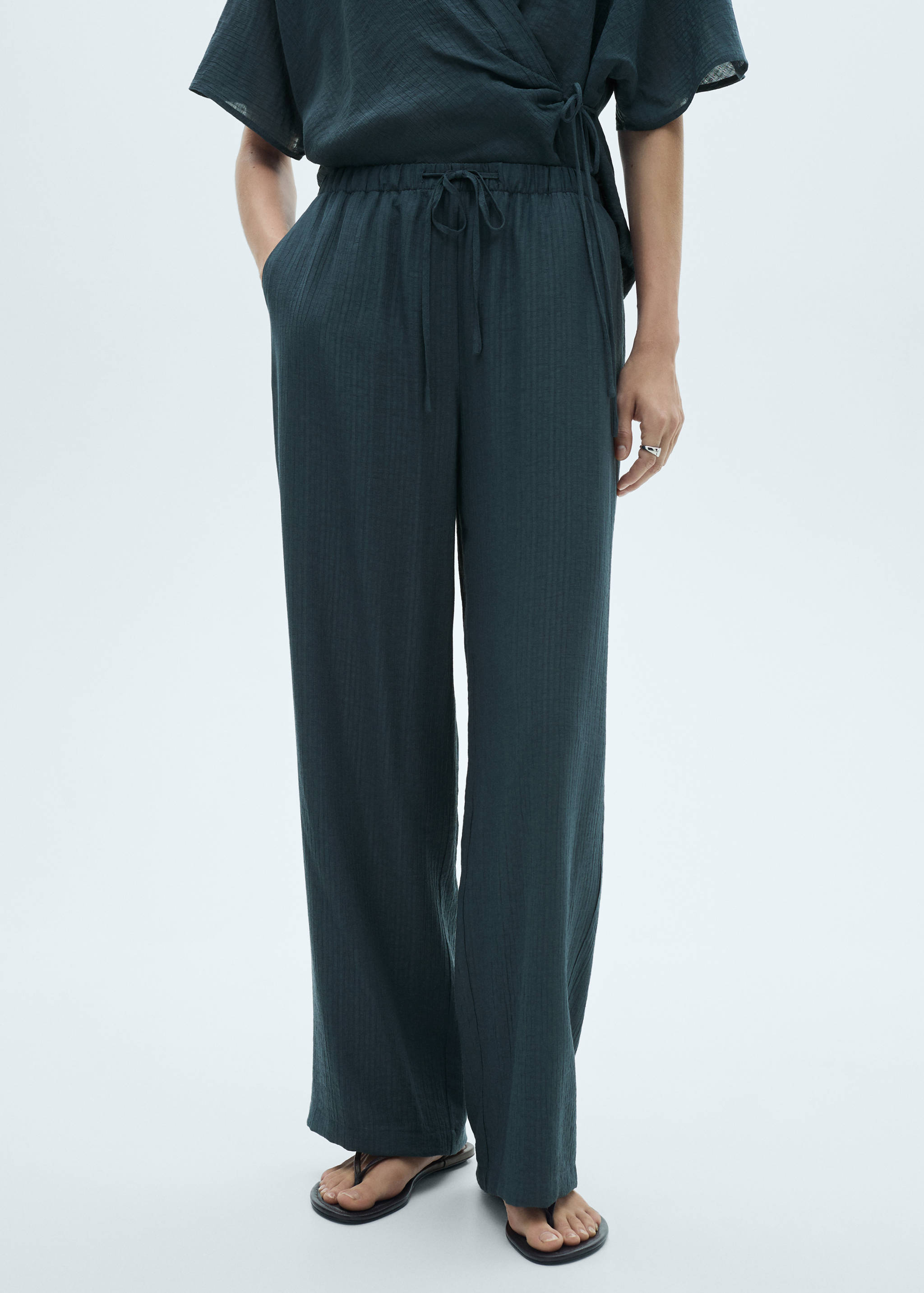Flowy trousers with knot detail - Details of the article 6