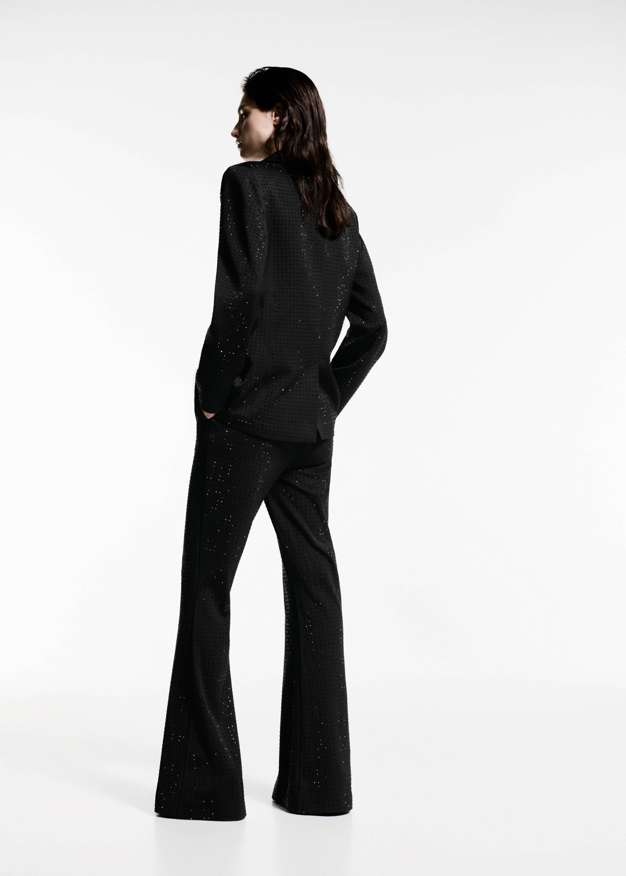Rhinestone flared trousers - Reverse of the article