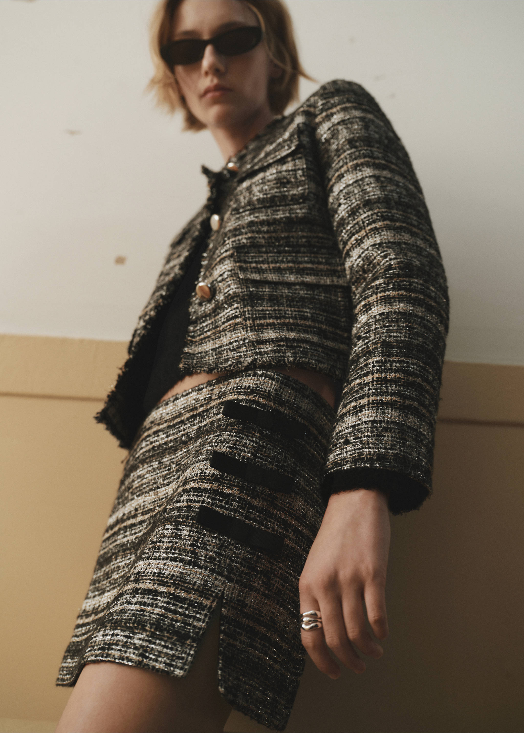 Tweed mini-skirt with bows - Details of the article 7, Black. Ref: 77079245-00.