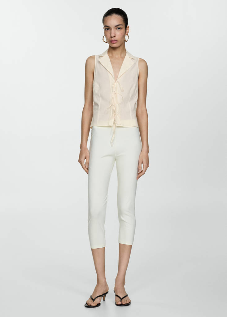 Sleeveless blouse with bows — Ecru