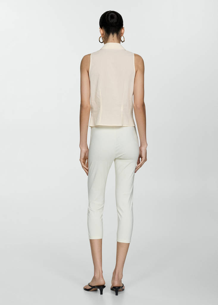 Sleeveless blouse with bows — Ecru
