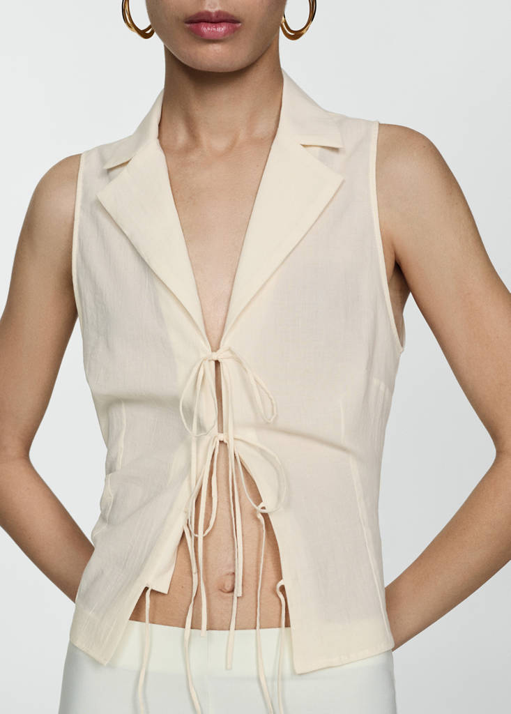 Sleeveless blouse with bows — Ecru