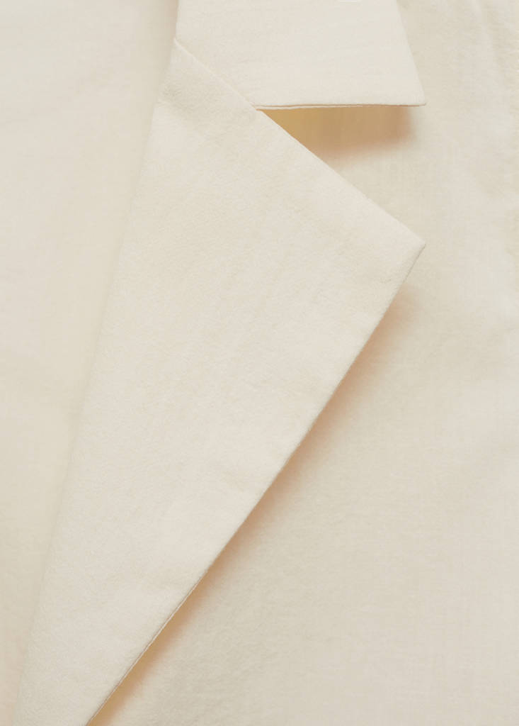 Sleeveless blouse with bows — Ecru