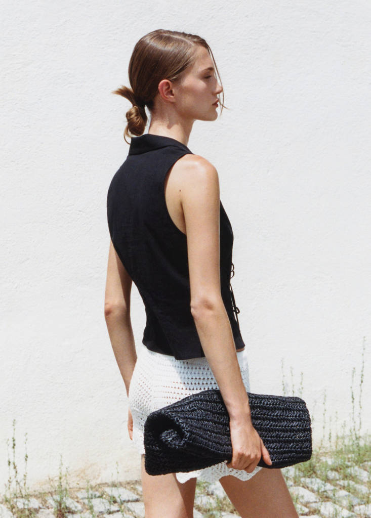 Sleeveless blouse with bows — Black