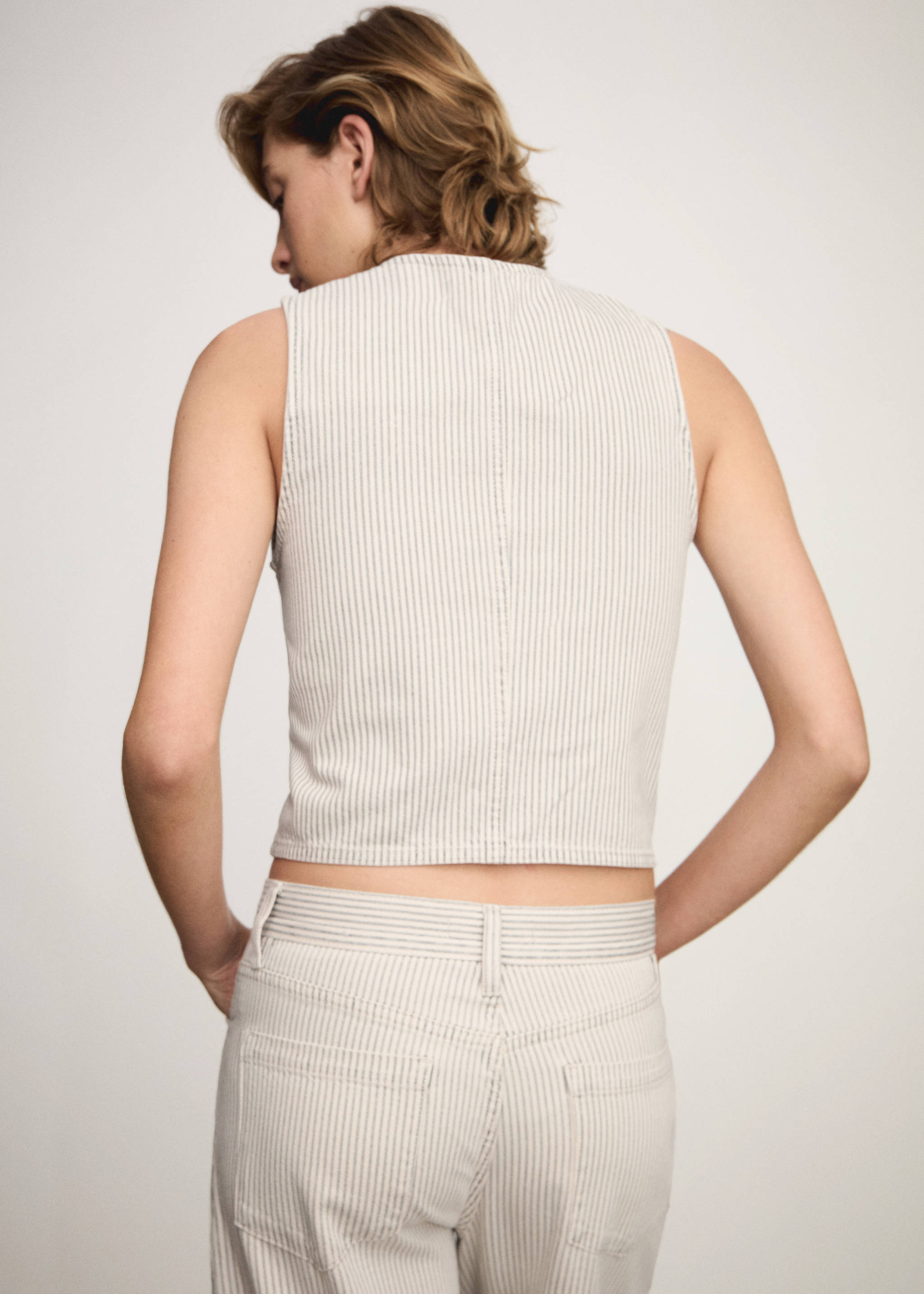 Striped vest with zip - Reverse of the article