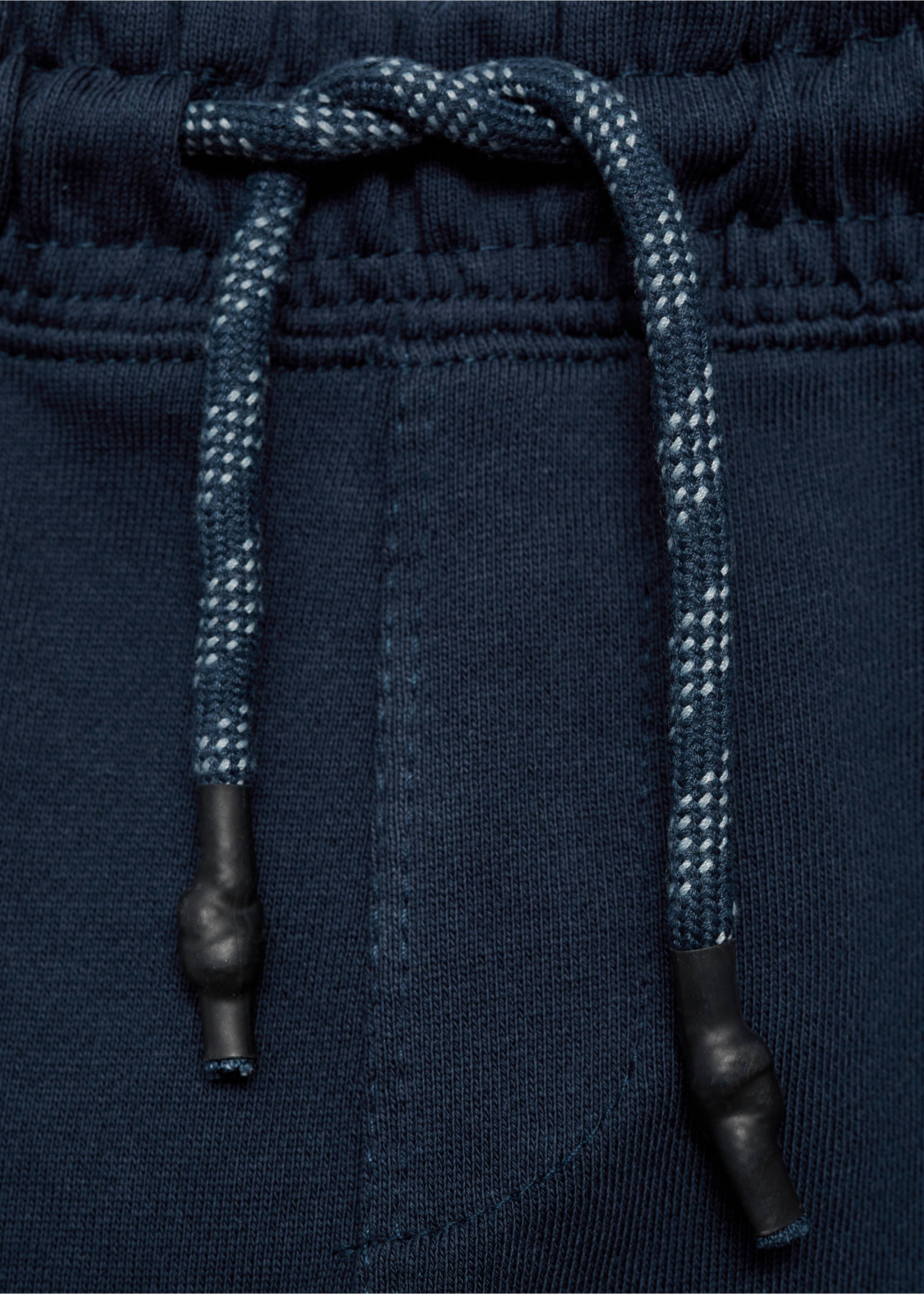 Cotton jogger-style trousers - Details of the article 8, Dark Navy. Ref: 77083271-00.