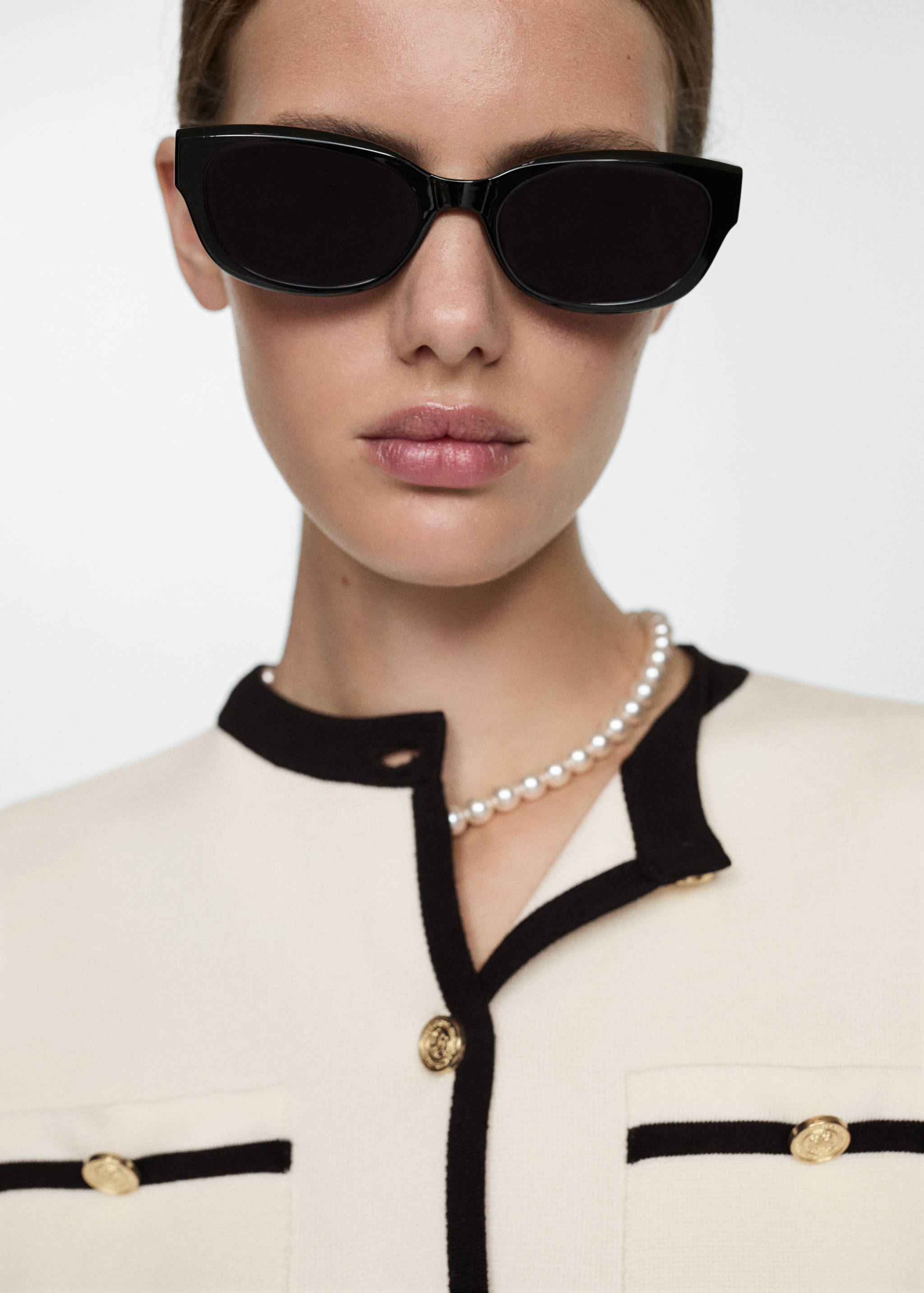 Short-sleeved cardigan with contrasting trims - Details of the article 1