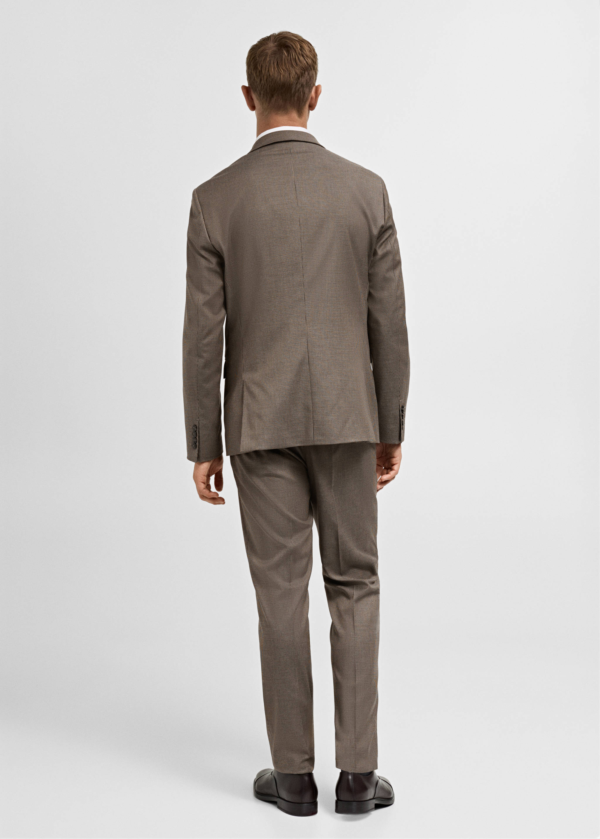 100% merino wool sweater with zip-up collar - Reverse of the article