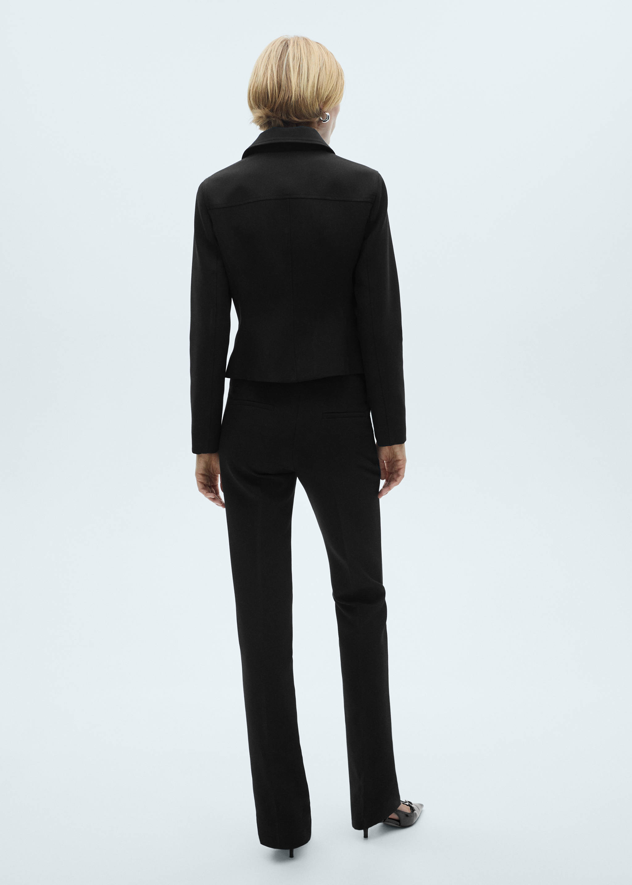 Flared trousers with zip - Reverse of the article