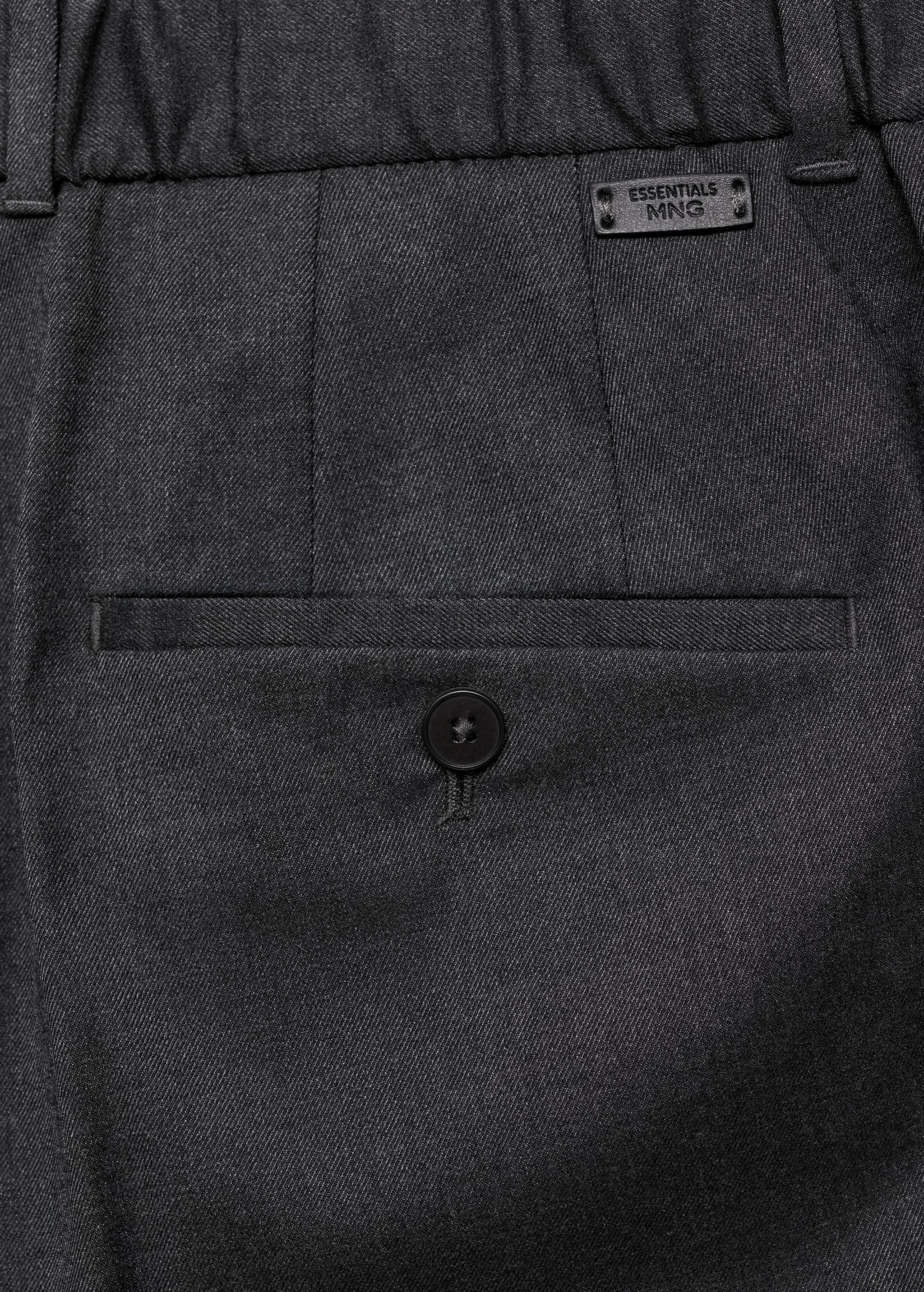 Pleated slim-fit trousers - Details of the article 0