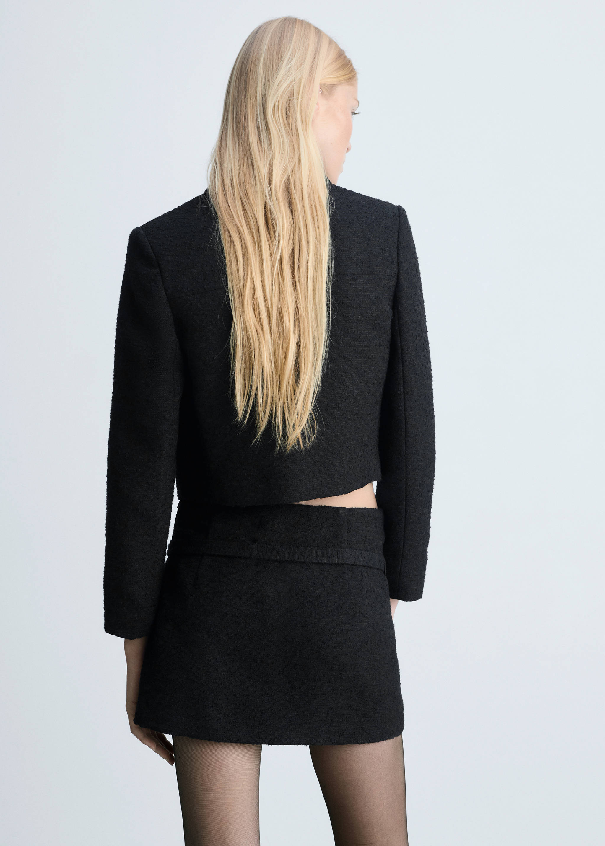 Tweed mini-skirt with decorative belt - Verso de l’article