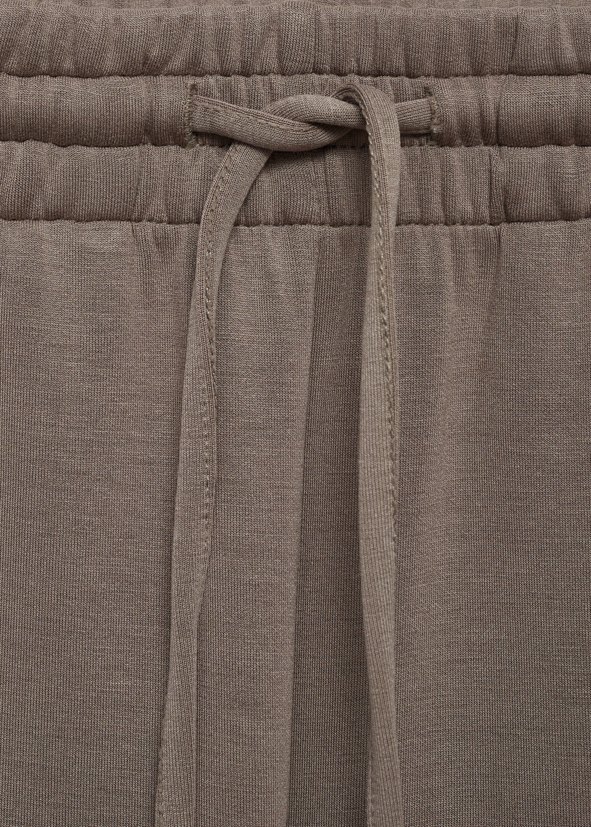 Jogger trousers with elastic waist - Details of the article 8