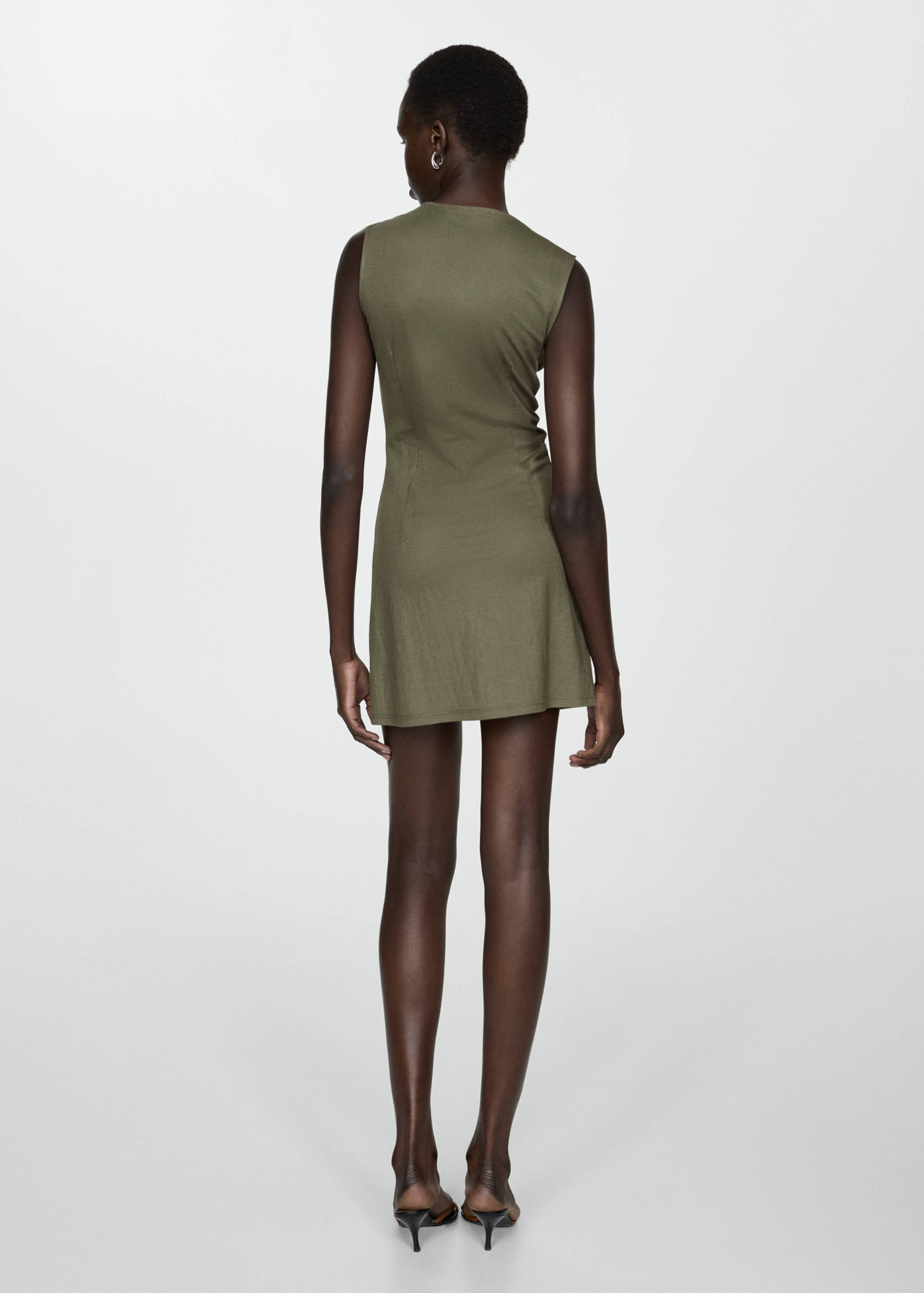 Vestit curt botons - Revers de l'article