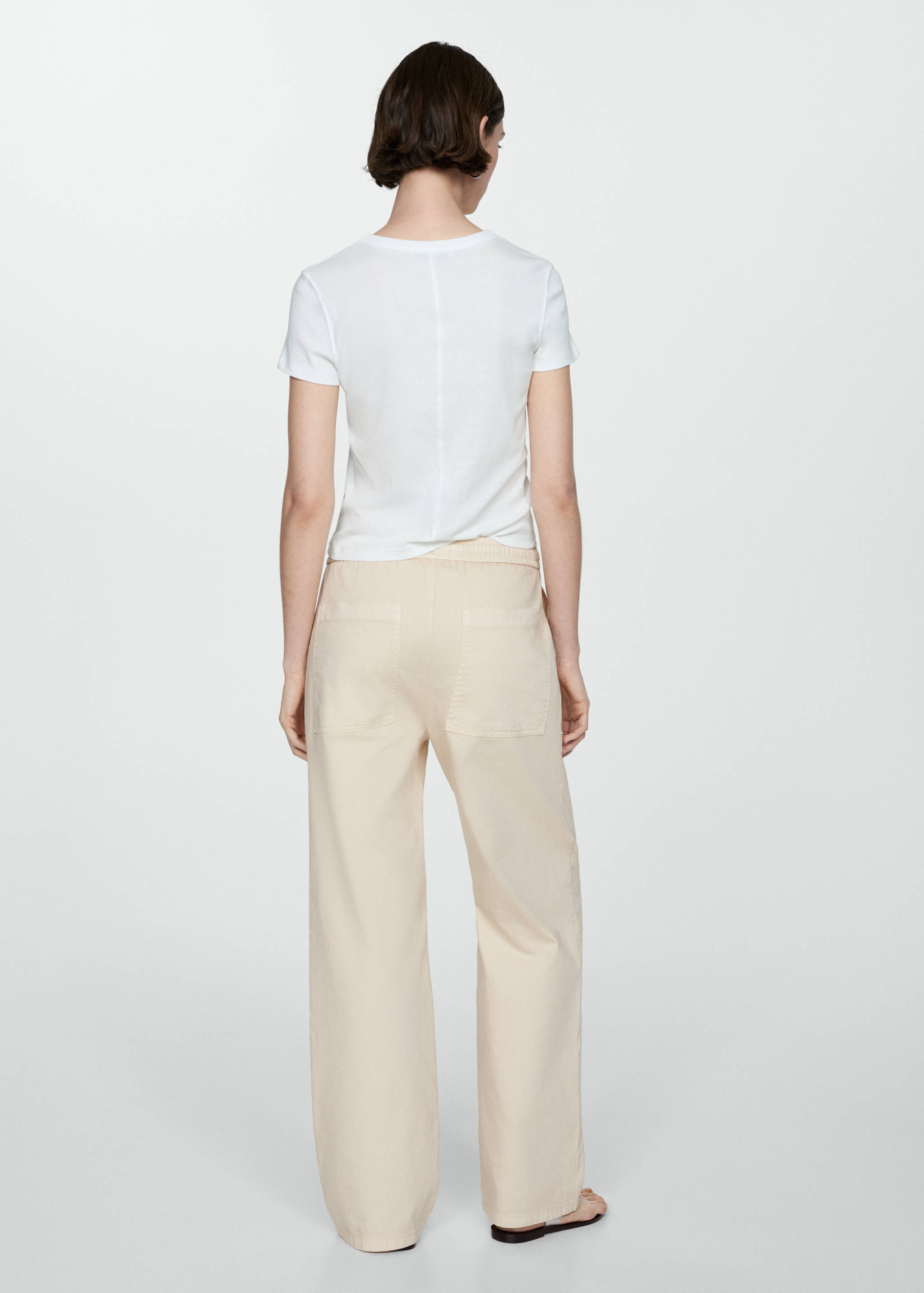 Elastic waist cotton trousers - Reverse of the article