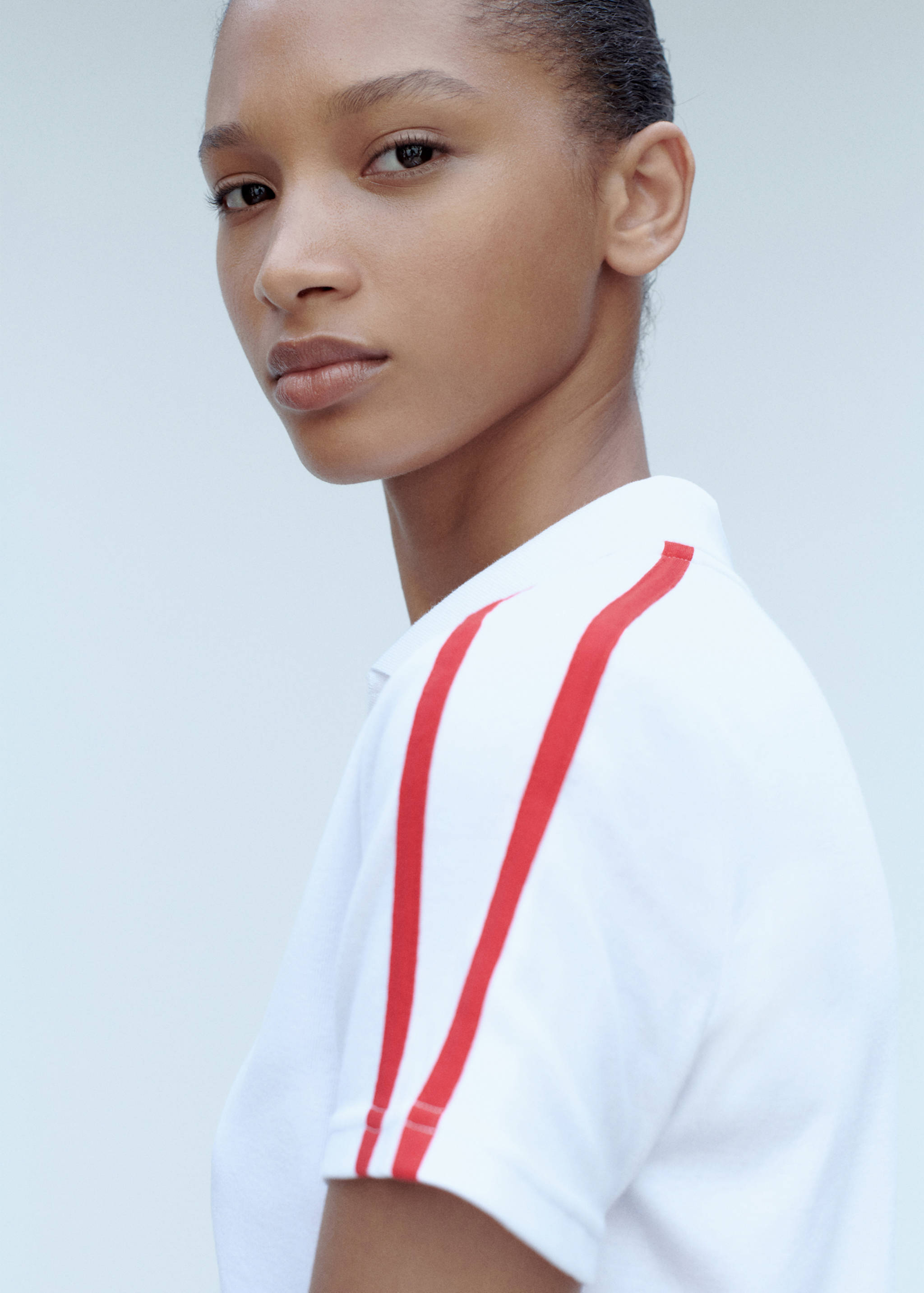 Contrasting stripes cotton polo shirt - Details of the article 1