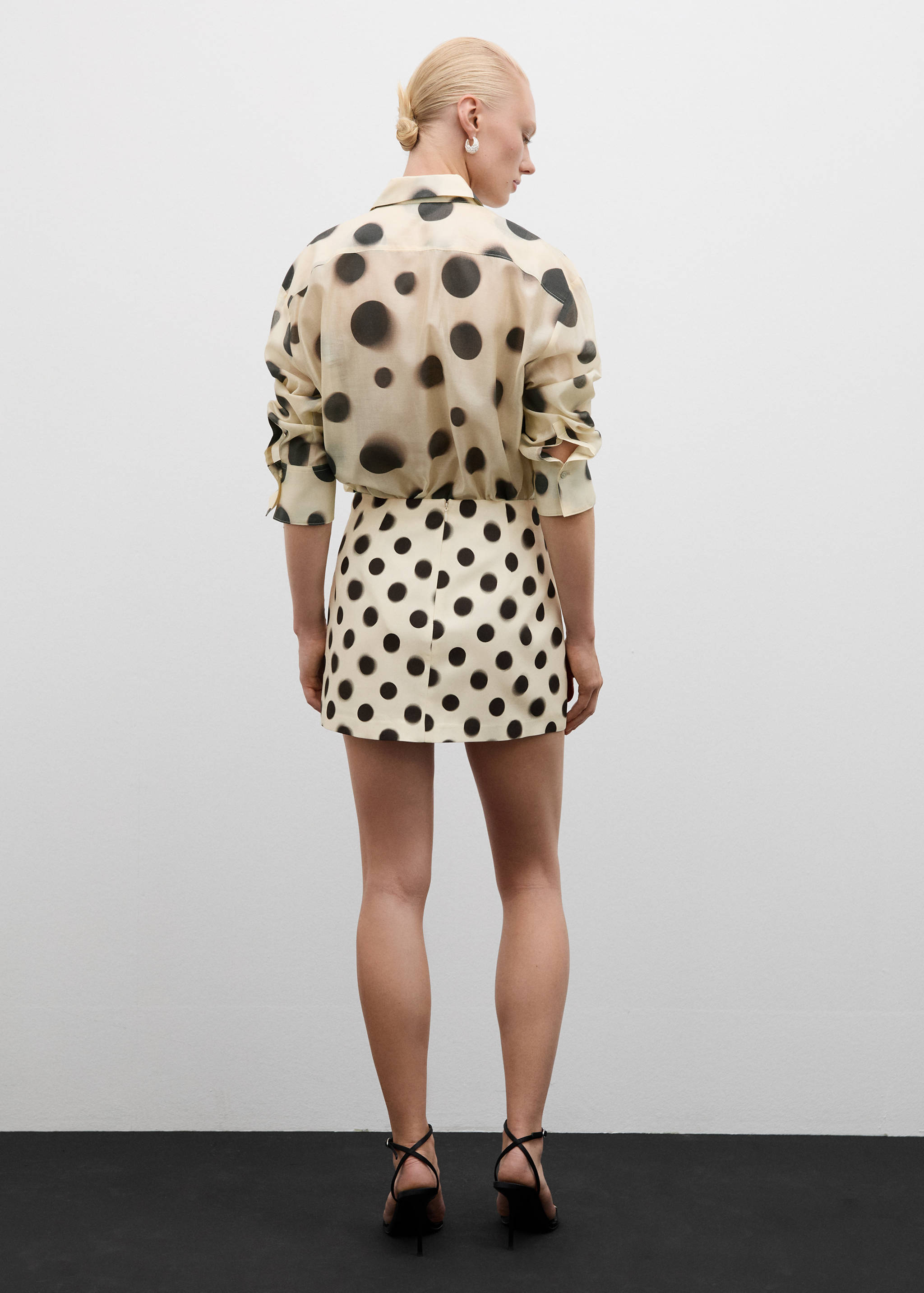 Polka-dot satin mini-skirt - Reverse of the article