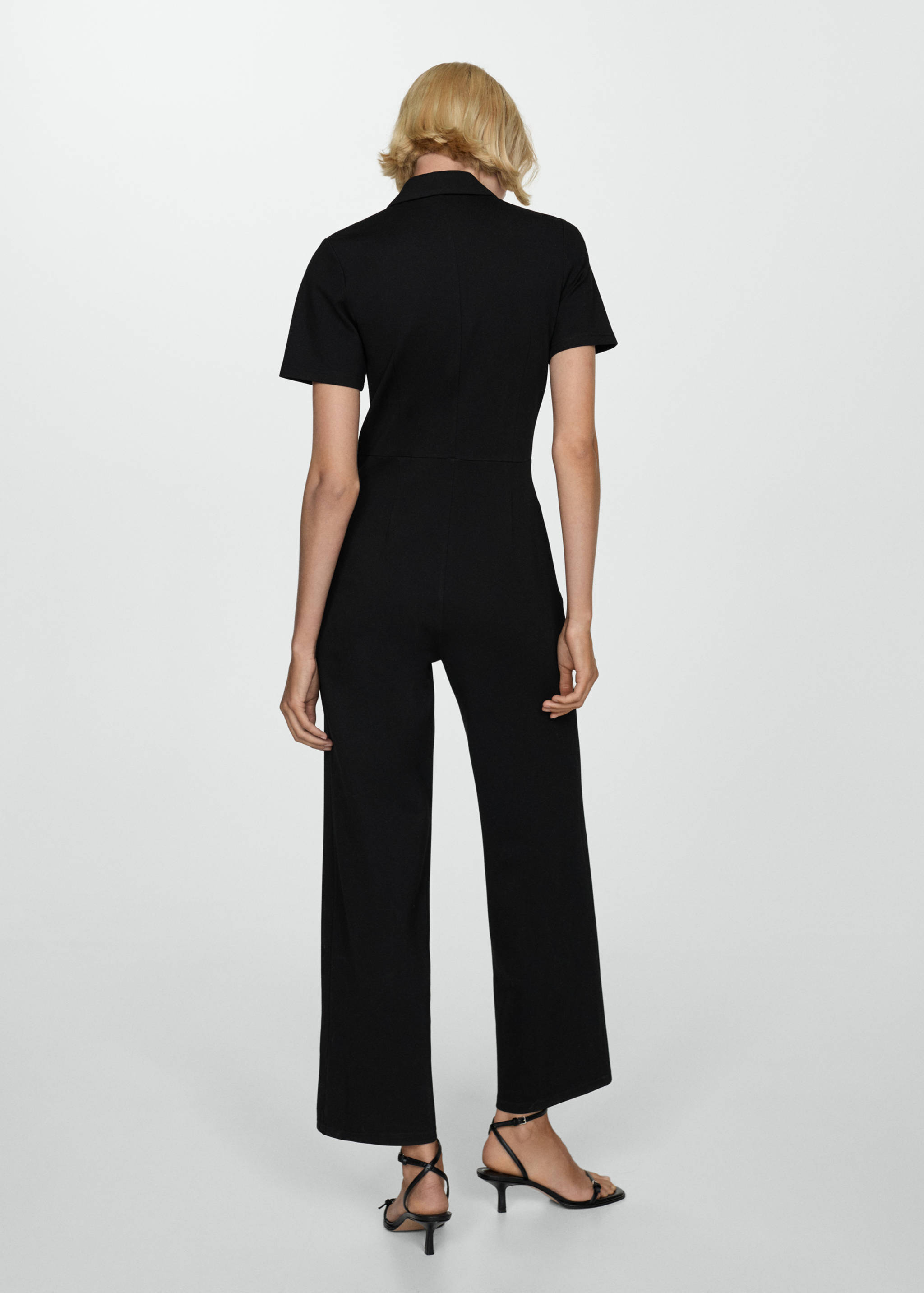 Long chest-pocket jumpsuit - Reverse of the article