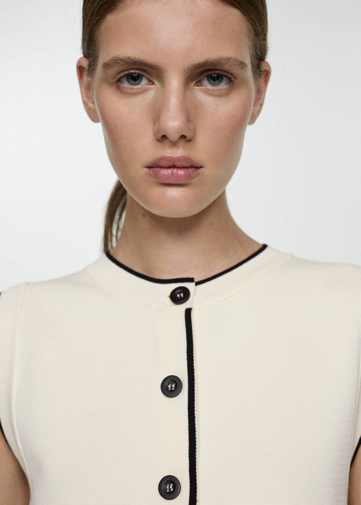 Knitted waistcoat with contrast piping — Ecru