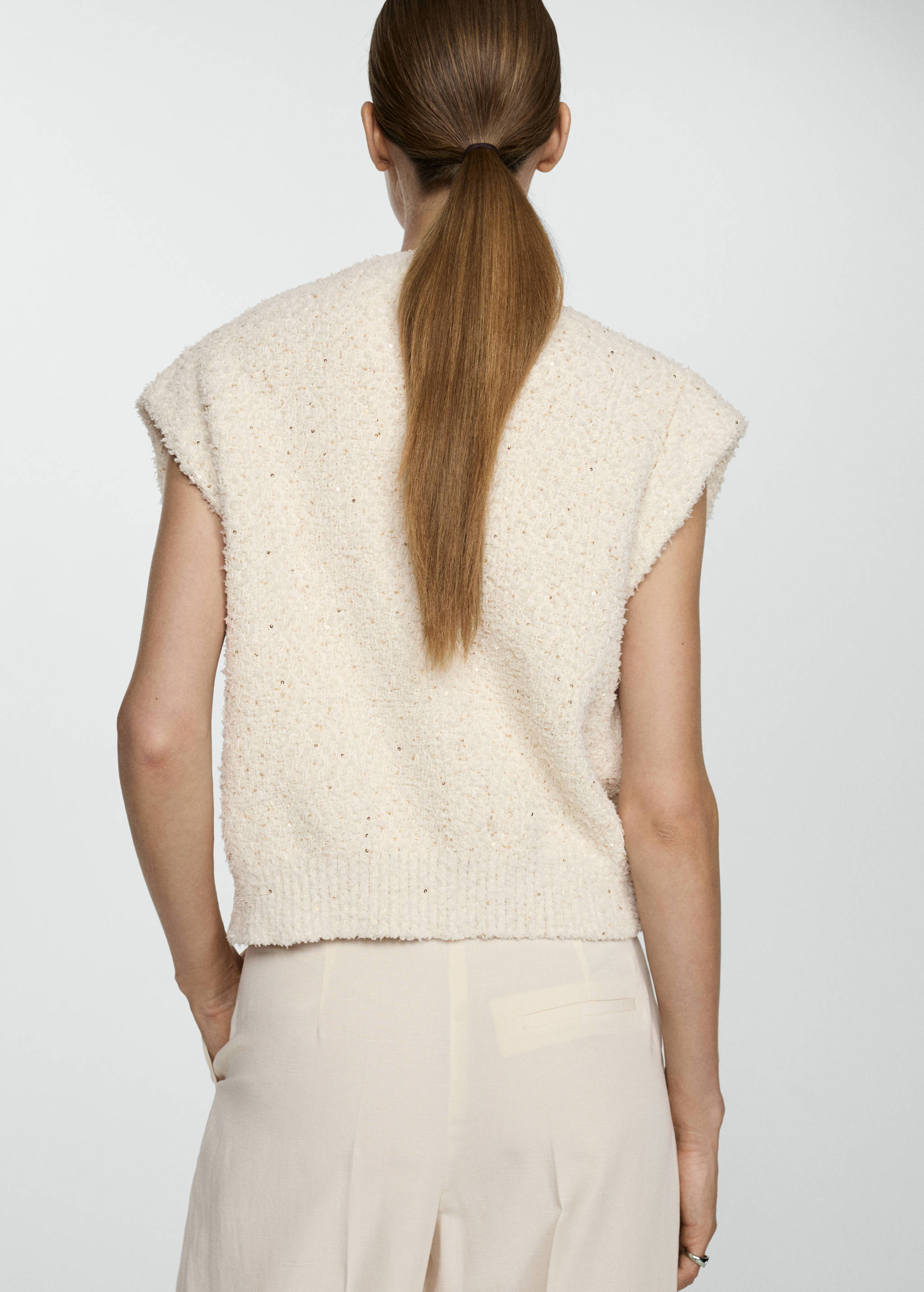 Gebreid gilet met pailletten - Achterkant van het artikel