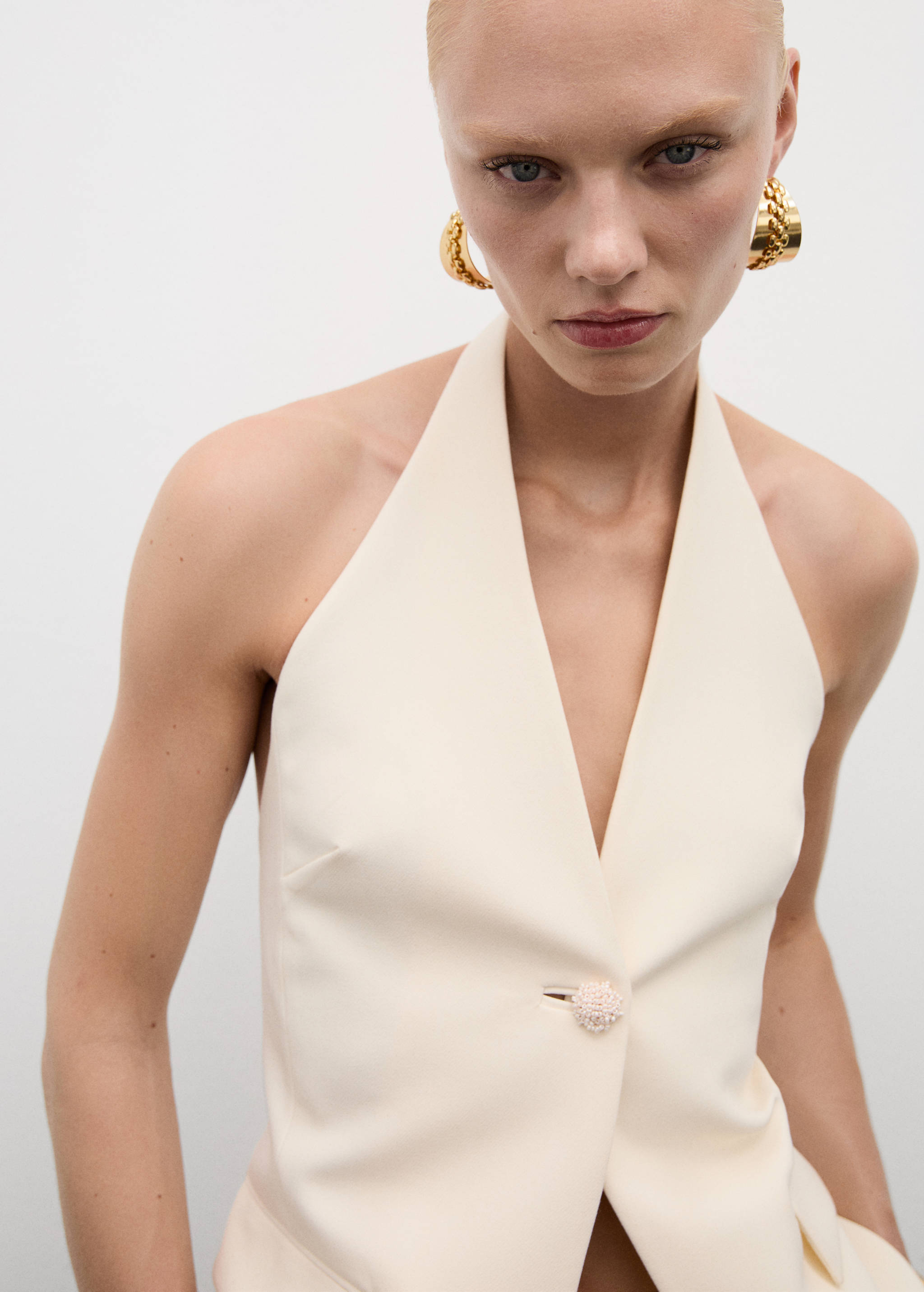 Halter-neck vest with jewel button - Details of the article 1