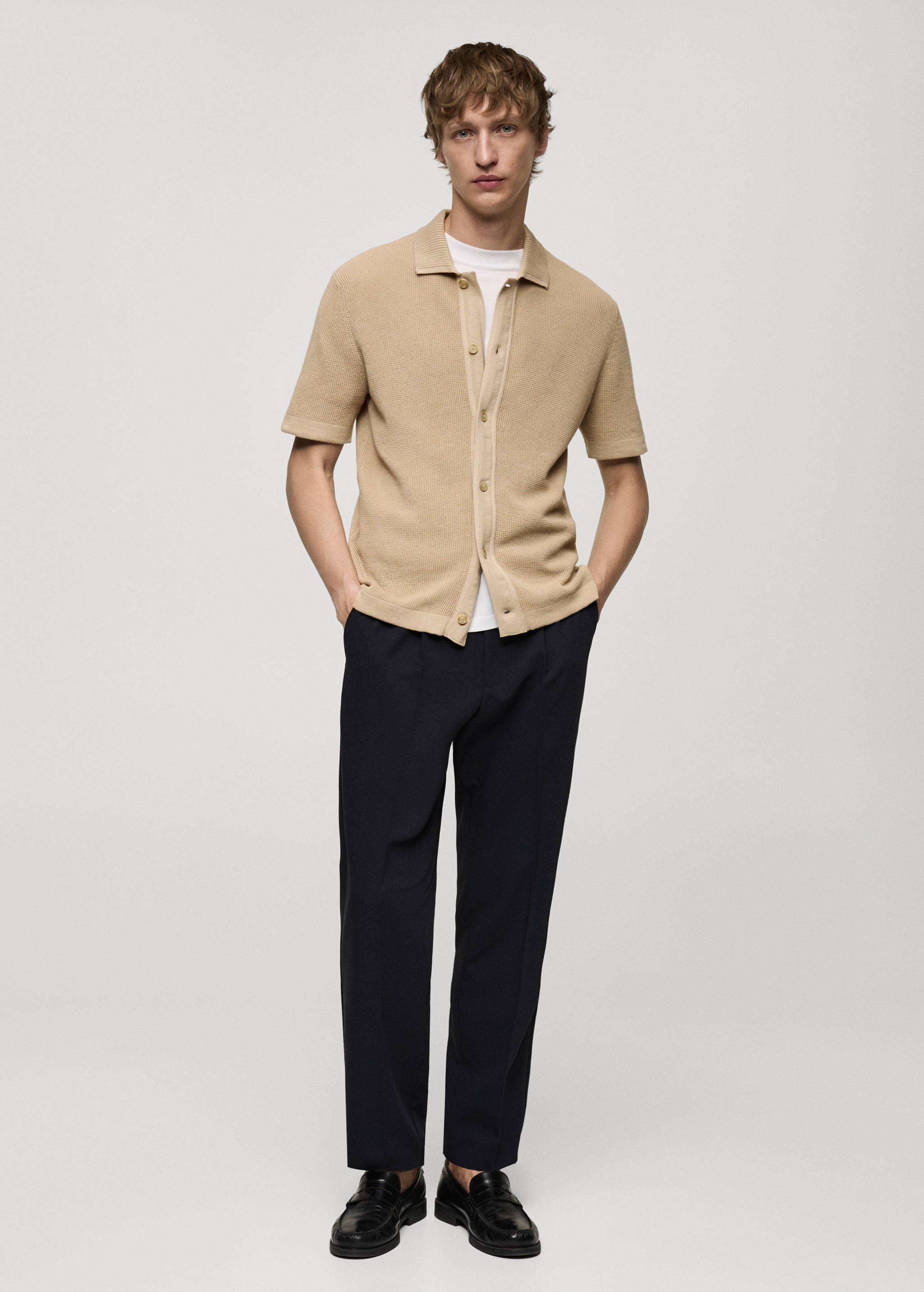 Buttoned micro-structure knitted polo shirt - General plane