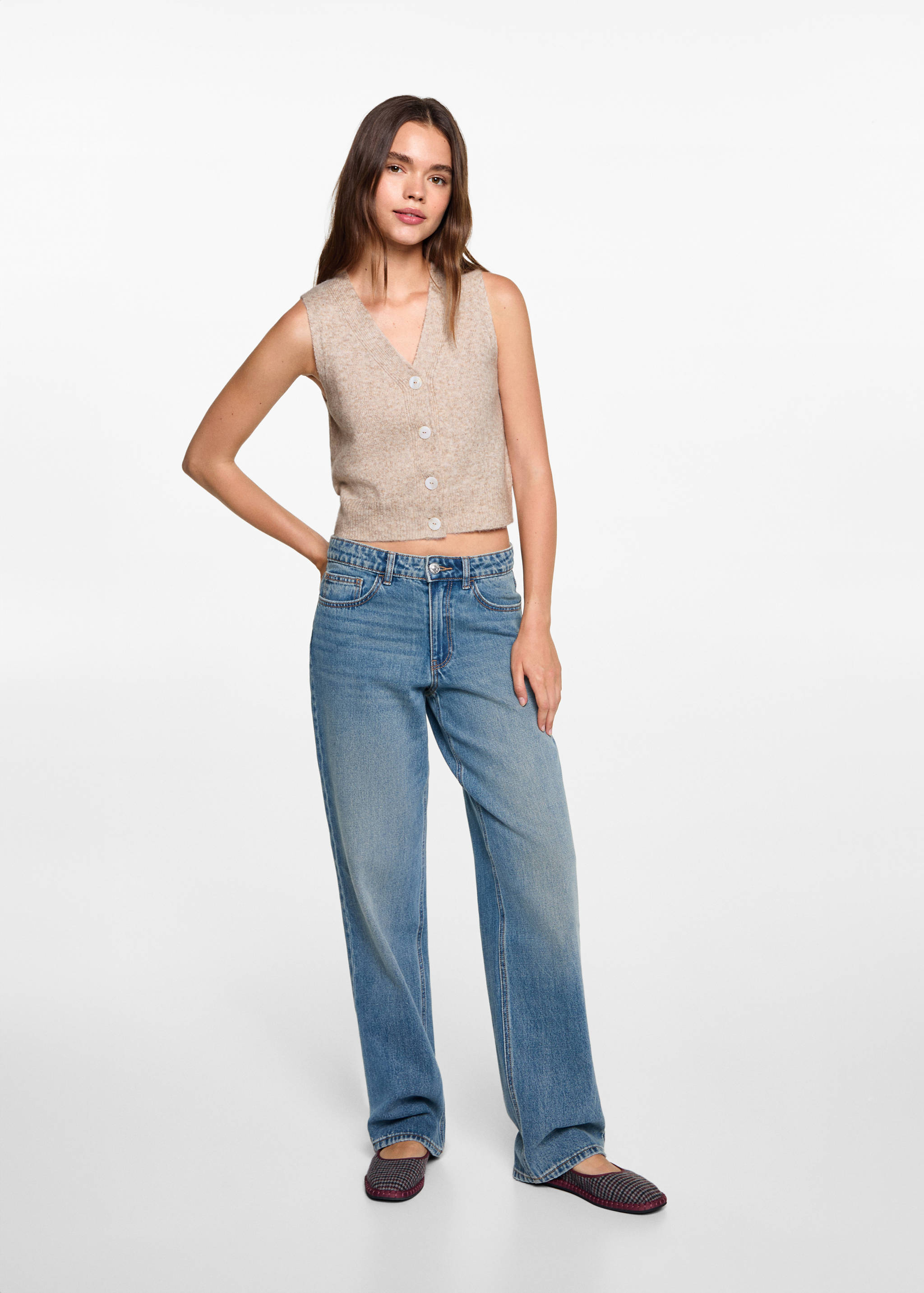 Colete de botões - Plano geral