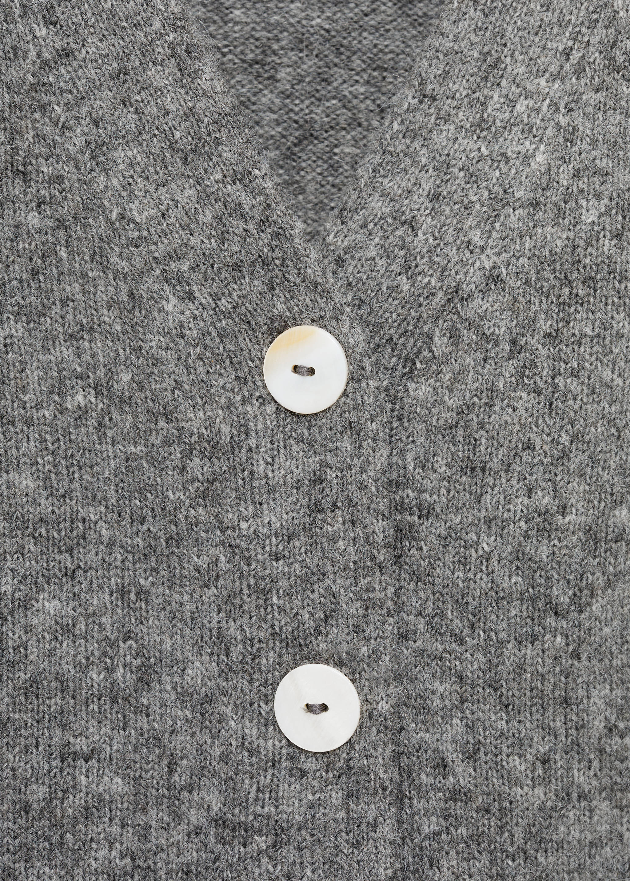 Colete de botões - Pormenor do artigo 8