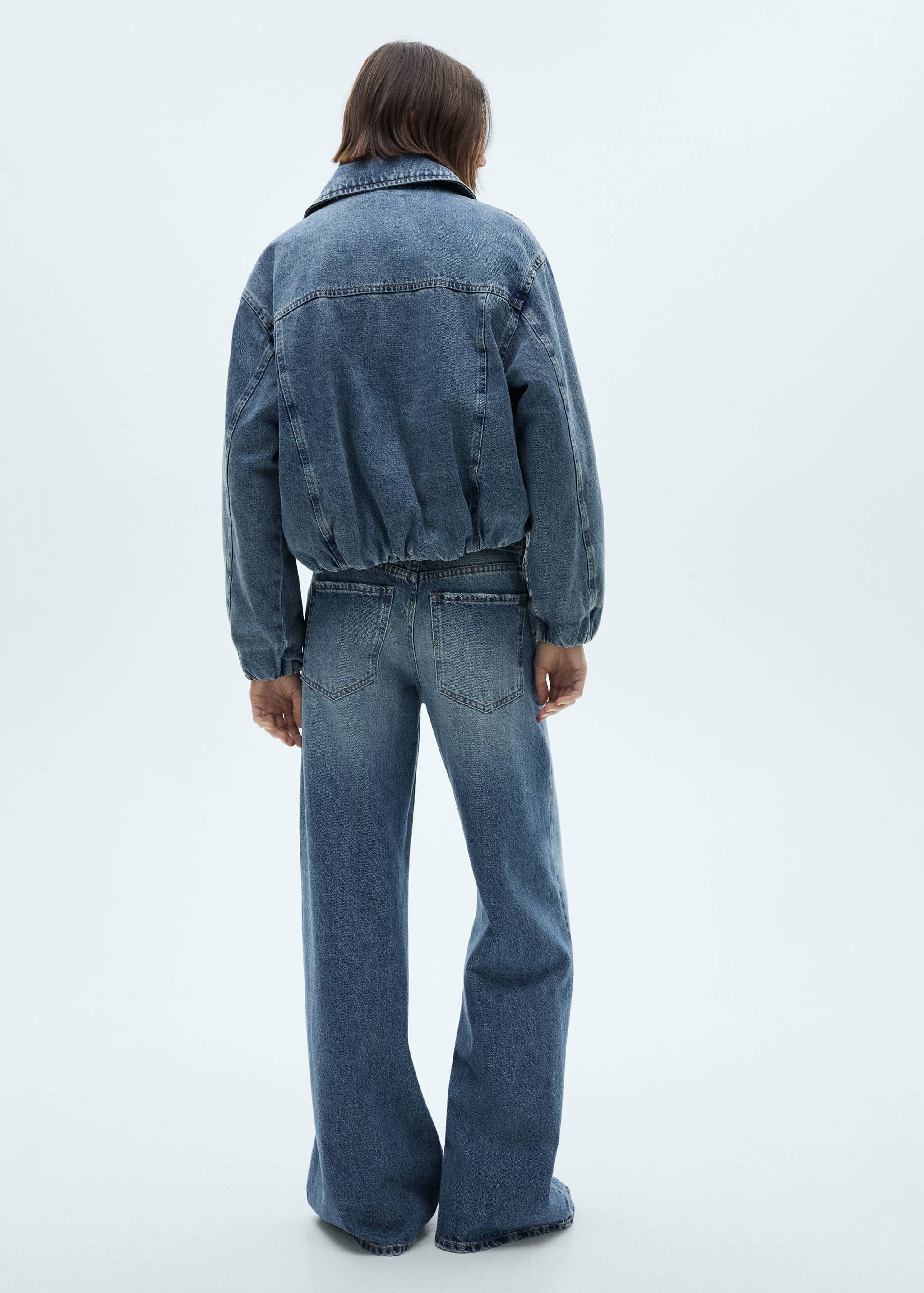 Pocketed denim jacket - Reverse of the article