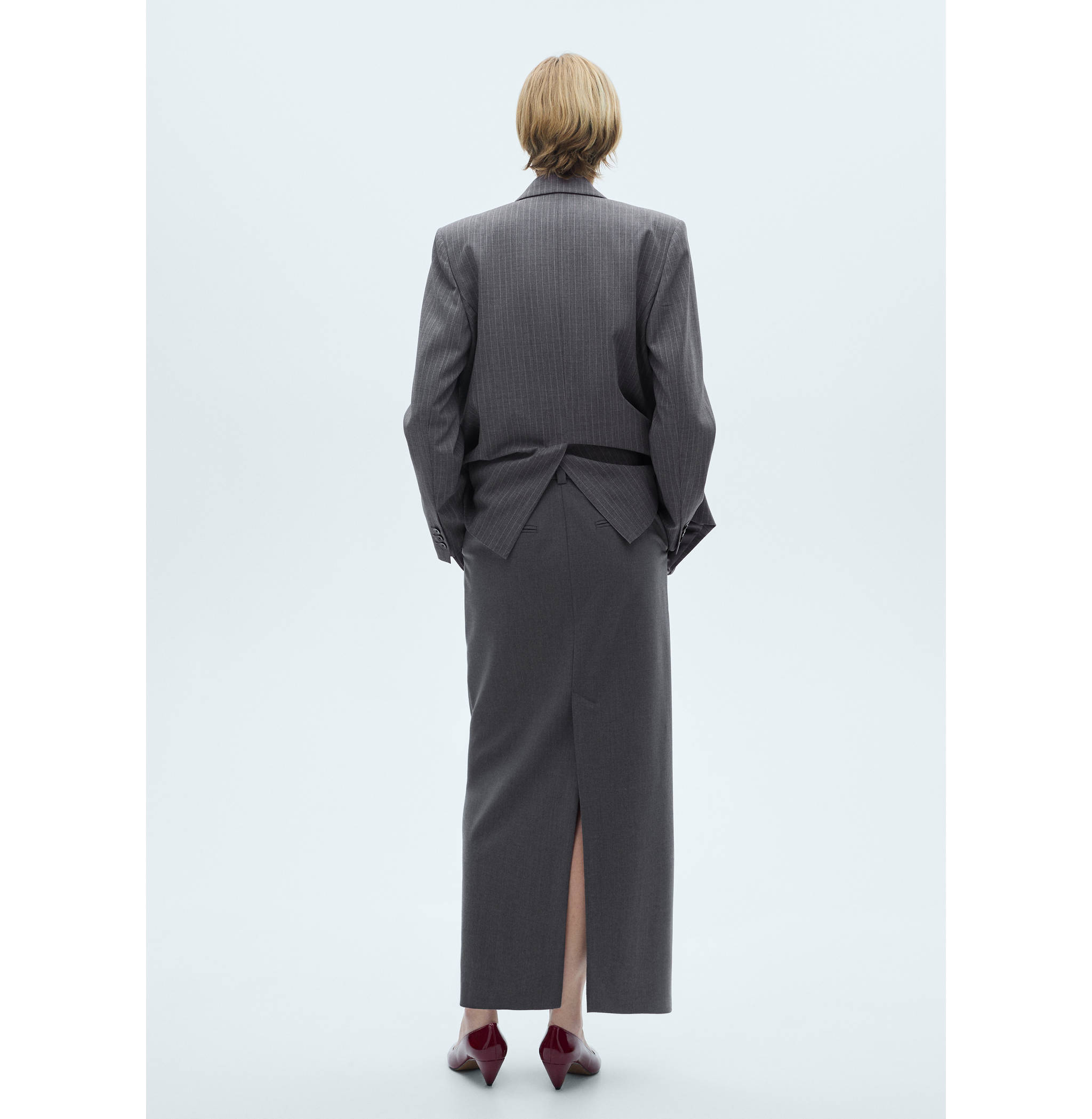 Long pencil skirt with opening - Reverse of the article