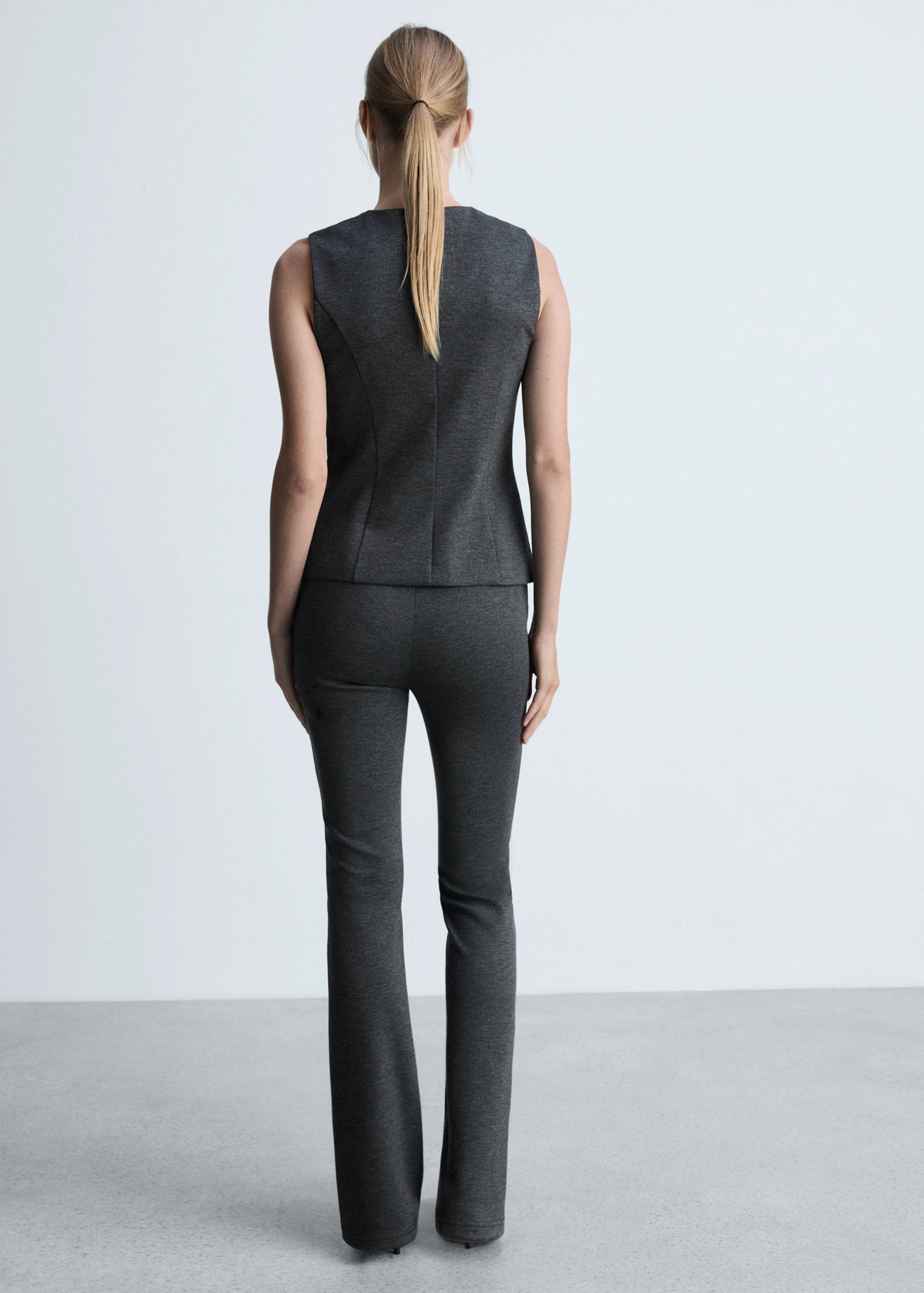 Flared trousers with seams - Reverse of the article